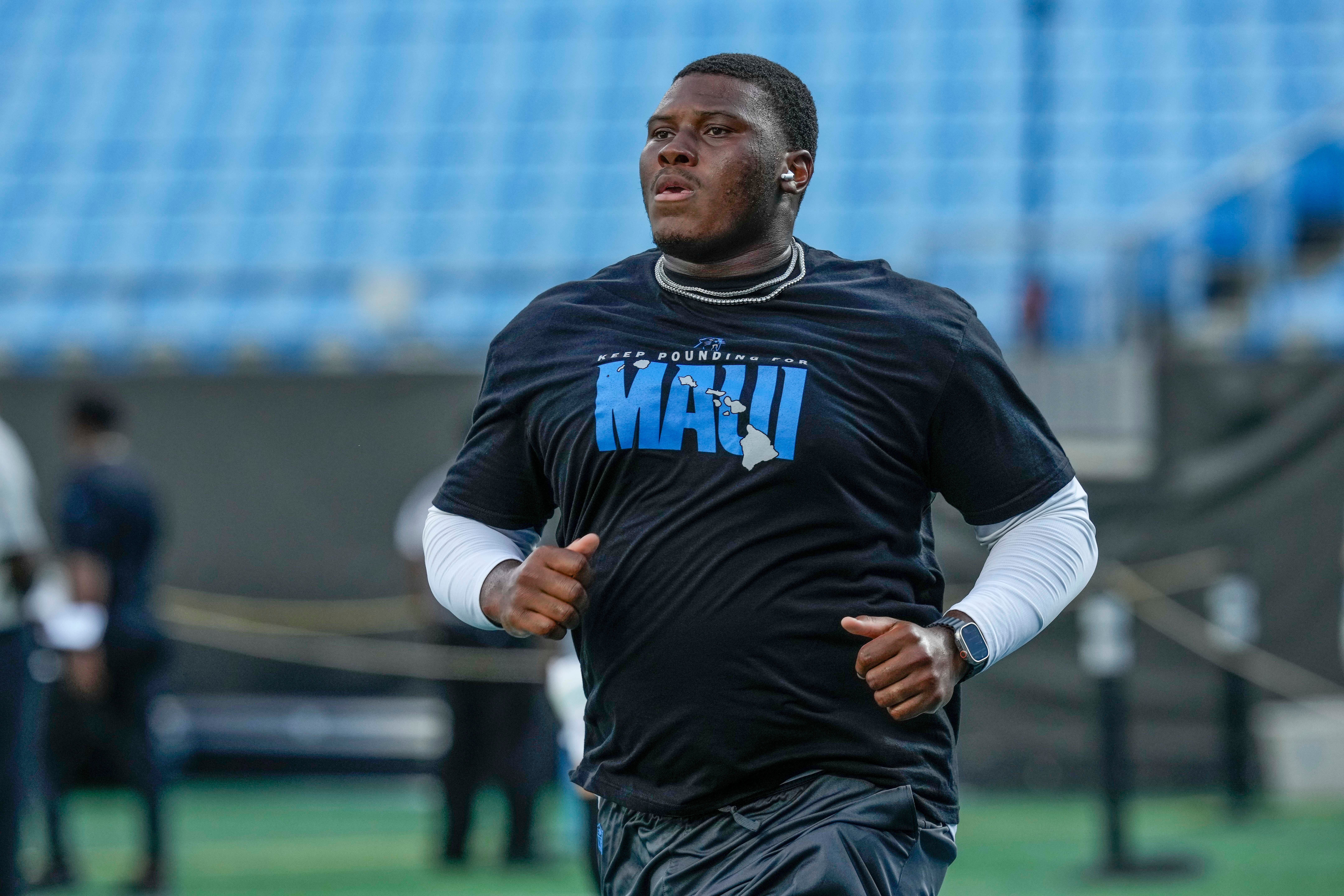 Aug 25, 2023; Charlotte, North Carolina, USA; Carolina Panthers defensive tackle Derrick Brown (95) during pregame warm ups against the Detroit Lions at Bank of America Stadium. Mandatory Credit: Jim Dedmon-USA TODAY Sports