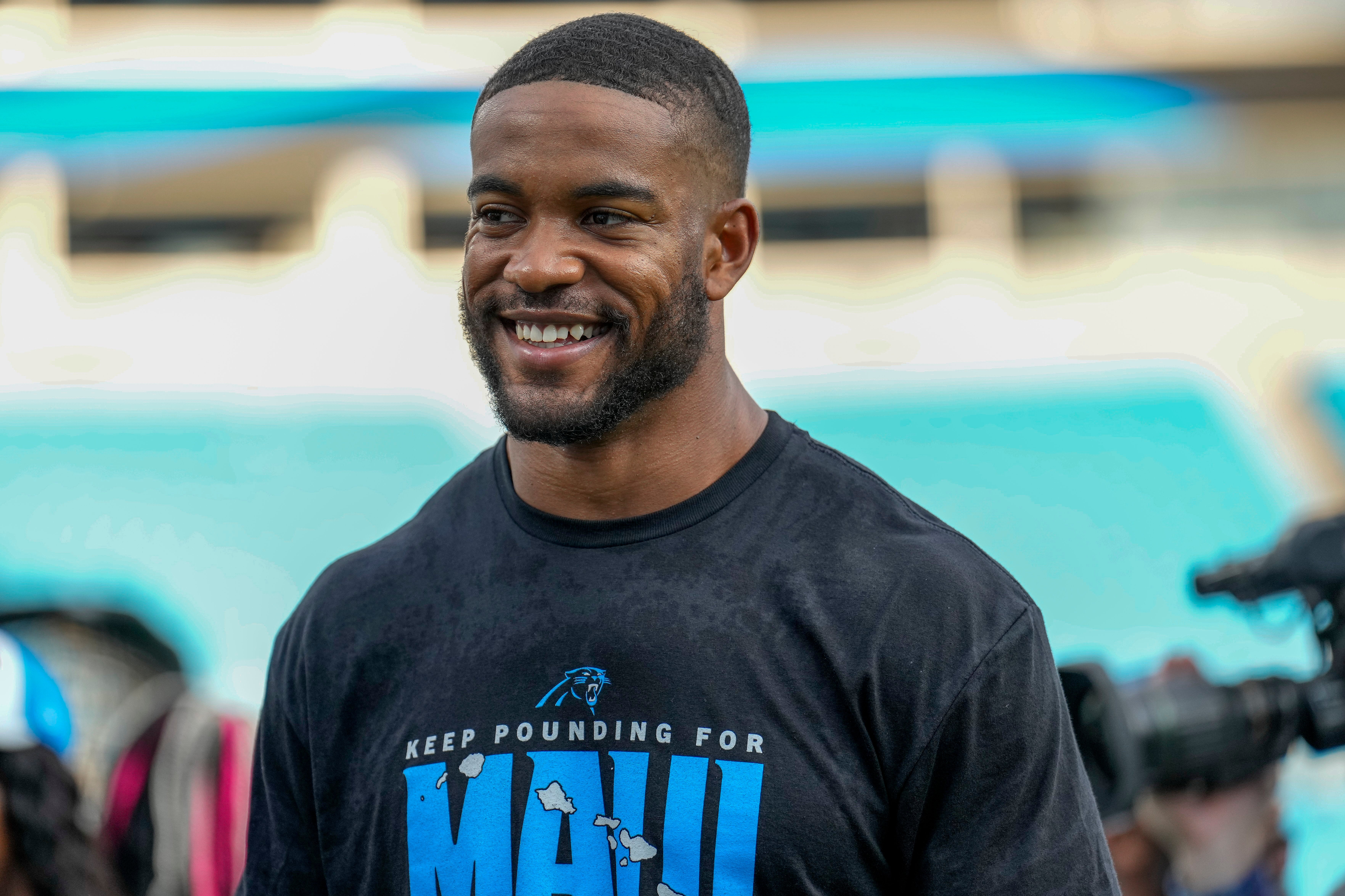 Aug 25, 2023; Charlotte, North Carolina, USA; Carolina Panthers safety Jeremy Chinn (21) talks with fans during pregame warm ups against the Detroit Lions at Bank of America Stadium. Mandatory Credit: Jim Dedmon-USA TODAY Sports