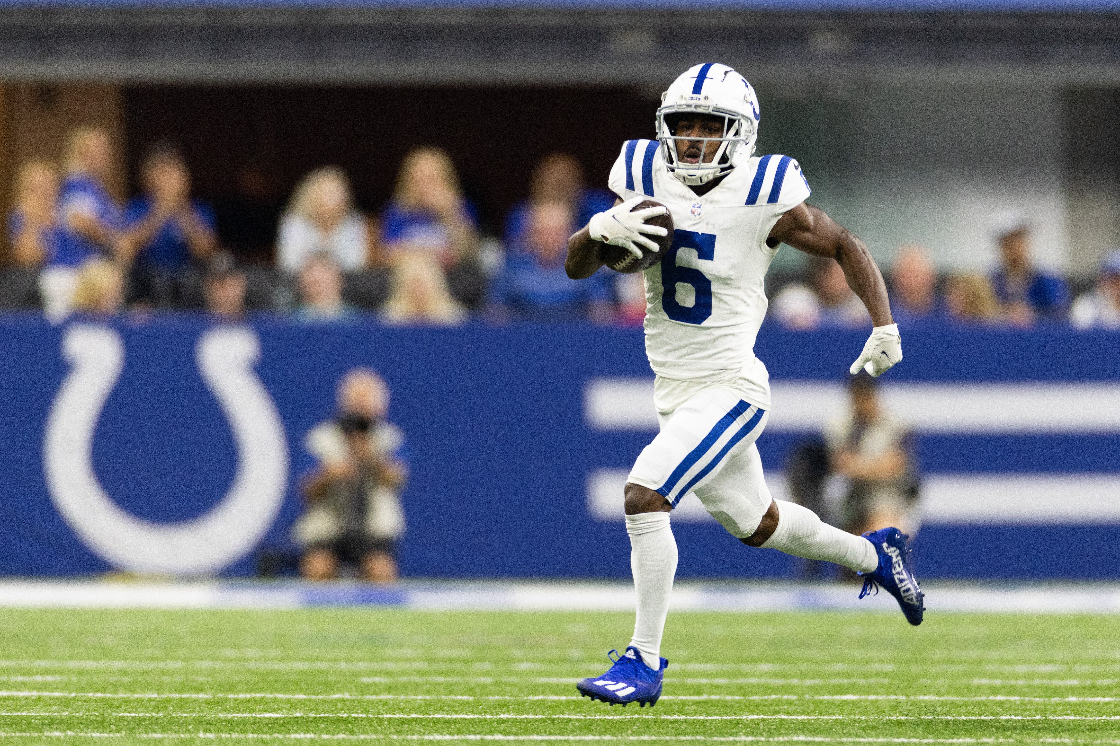 Aug 19, 2023; Indianapolis, Indiana, USA; Indianapolis Colts wide receiver Isaiah McKenzie (6) runs the ball in the second half against the Chicago Bears at Lucas Oil Stadium.
