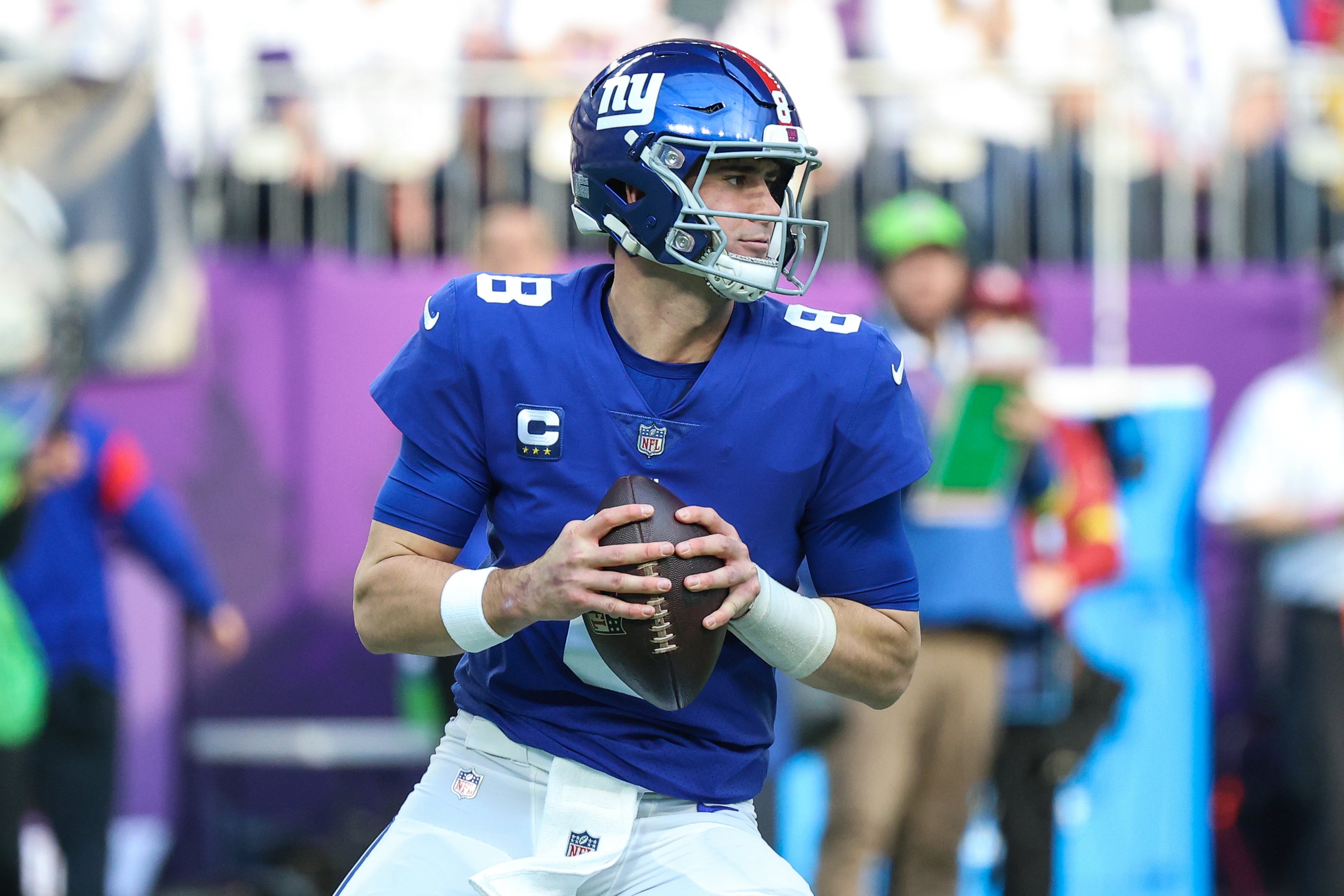 Dec 24, 2022; Minneapolis, Minnesota, USA; New York Giants quarterback Daniel Jones (8) looks to pass against the Minnesota Vikings during the first quarter at U.S. Bank Stadium.