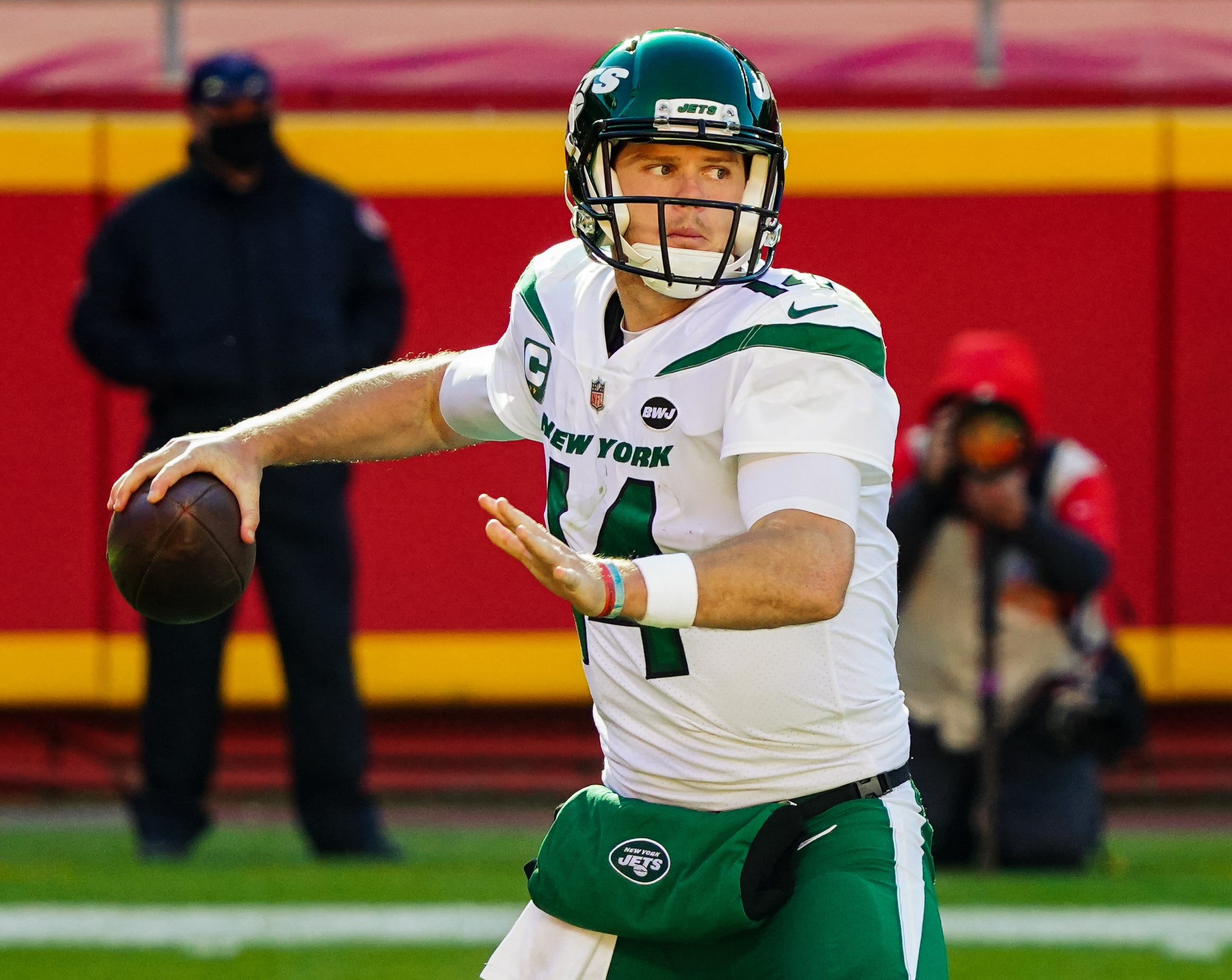 Nov 1, 2020; Kansas City, Missouri, USA; New York Jets quarterback Sam Darnold (14) throws a pass against the Kansas City Chiefs during the second half at Arrowhead Stadium.