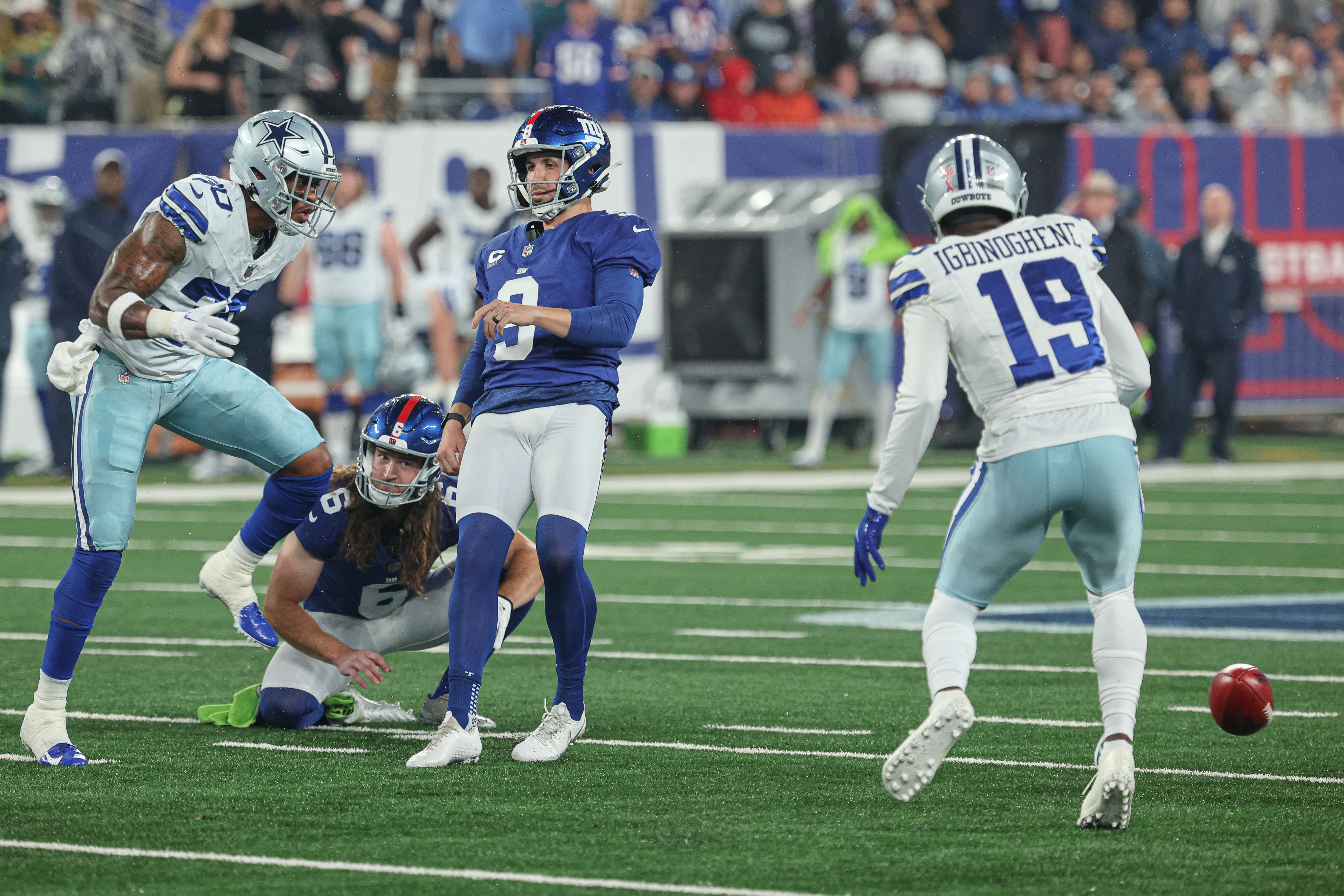 Dallas Cowboys safety Juanyeh Thomas (30) blocks a field goal attempt by New York Giants place kicker Graham Gano (9) as cornerback Noah Igbinoghene (19) recovers the block during the first quarter at MetLife Stadium. Mandatory Credit: Vincent Carchietta-USA TODAY Sports