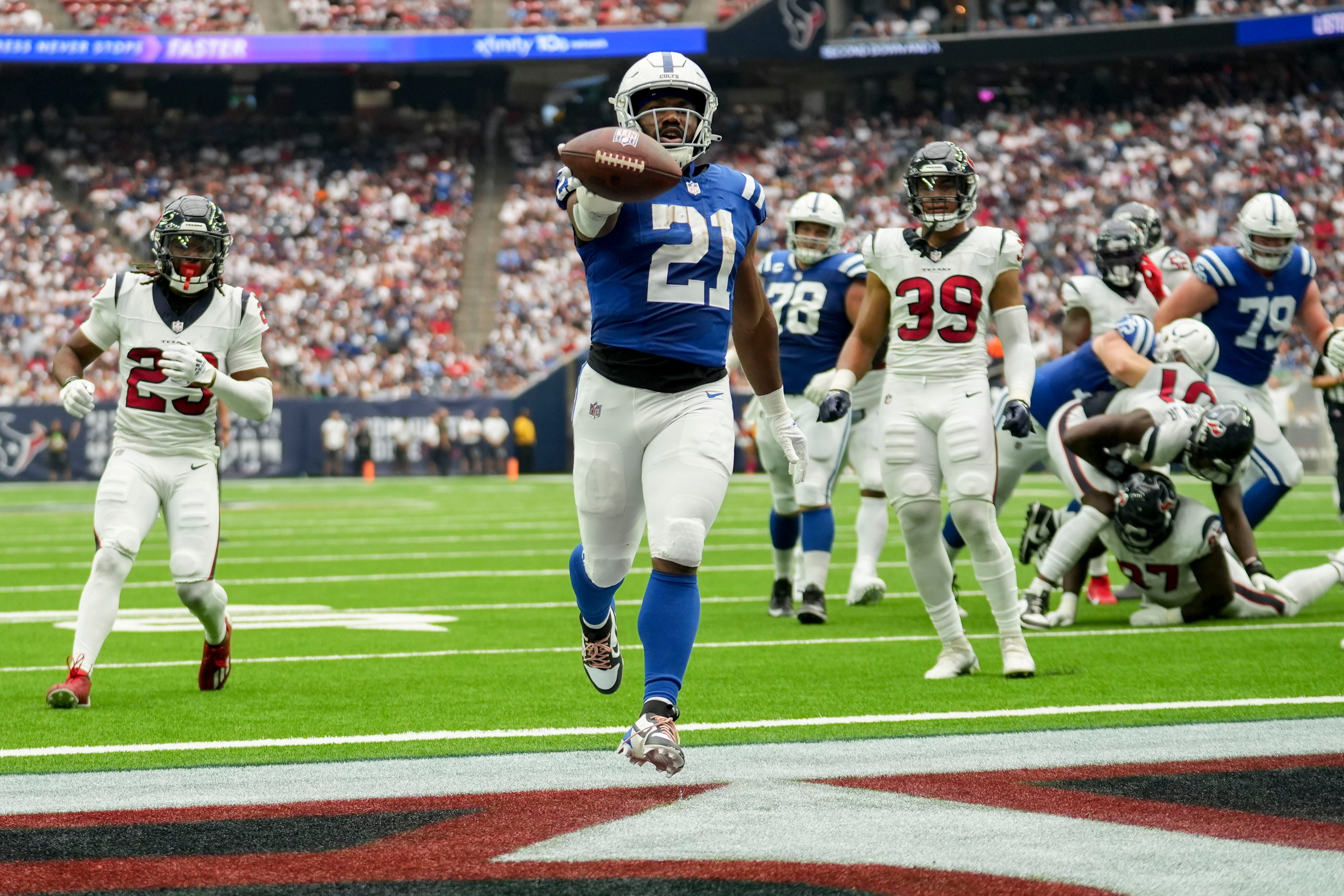 Indianapolis Colts running back Zack Moss (21) runs in a touchdown Sunday, Sept. 17, 2023, during a game against the Houston Texans at NRG Stadium in Houston