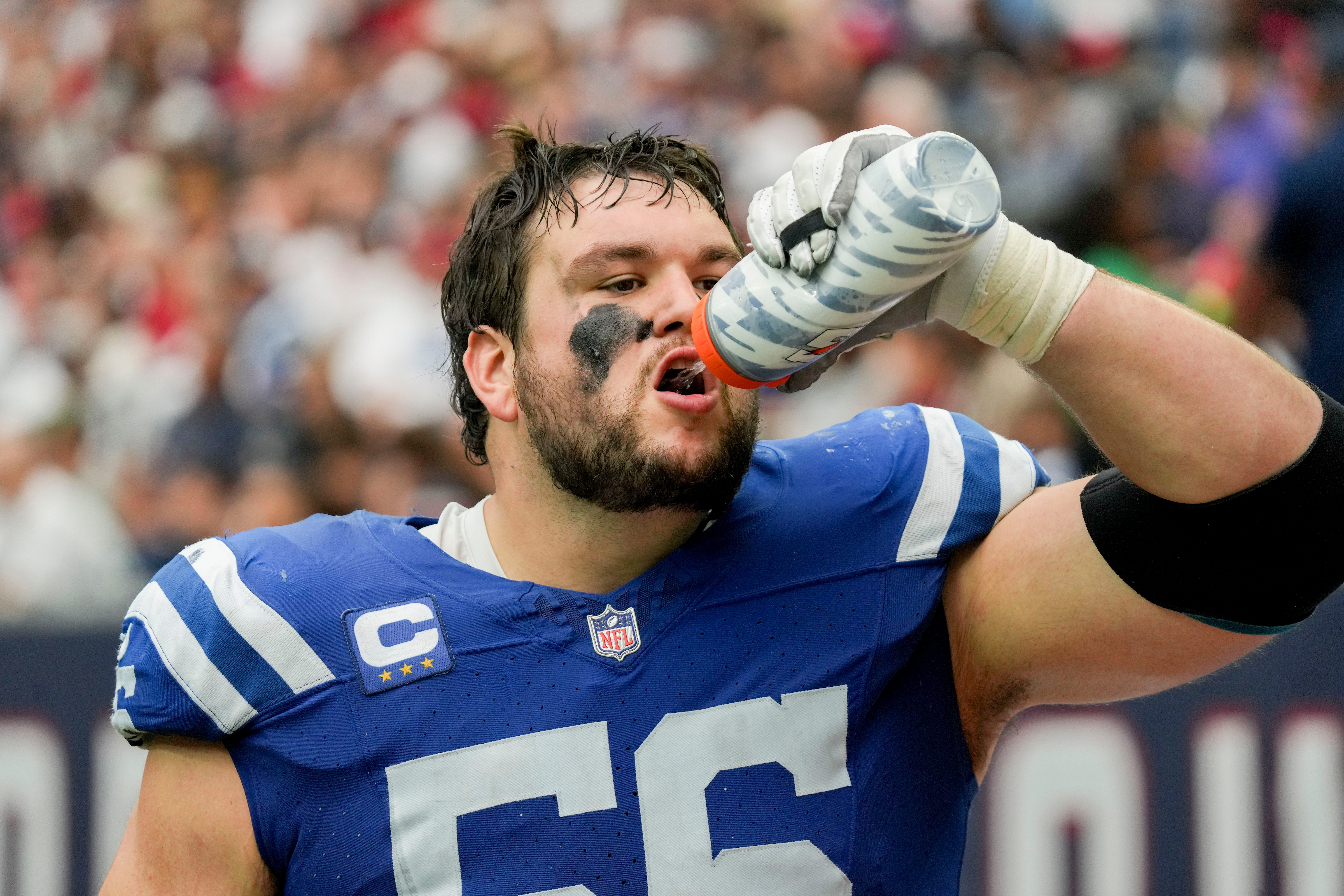 Indianapolis Colts guard Quenton Nelson (56) drinks water on the sideline Sunday, Sept. 17, 2023, during a game against the Houston Texans at NRG Stadium in Houston
