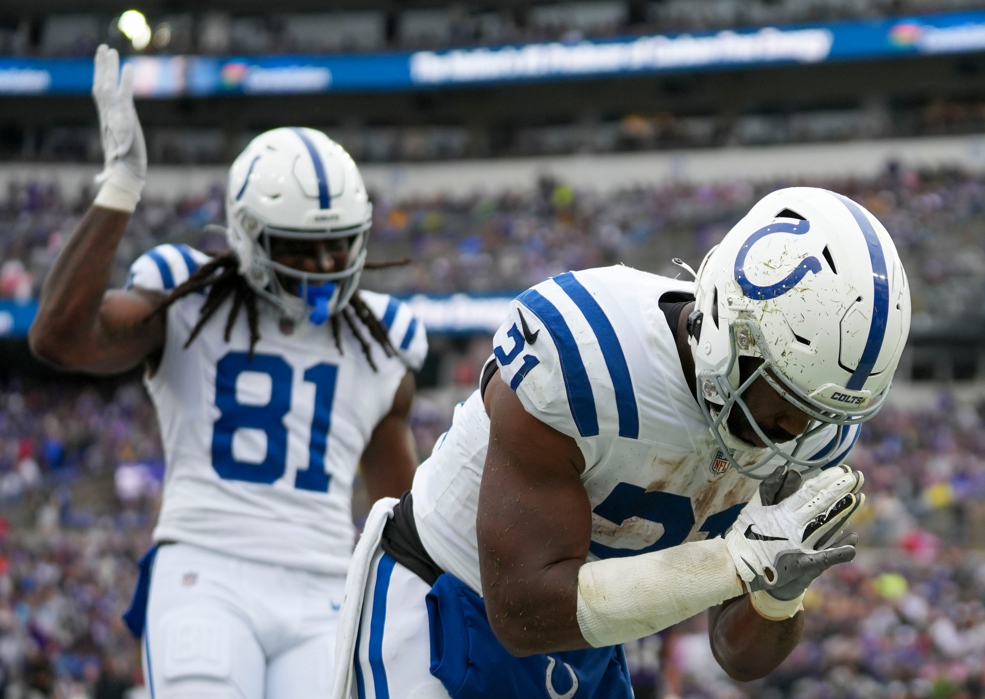 Indianapolis Colts running back Zack Moss (21) takes a bow after scoring a second-quarter touchdown on Sunday, Sept. 24, 2023, at M&T Bank Stadium in Baltimore.