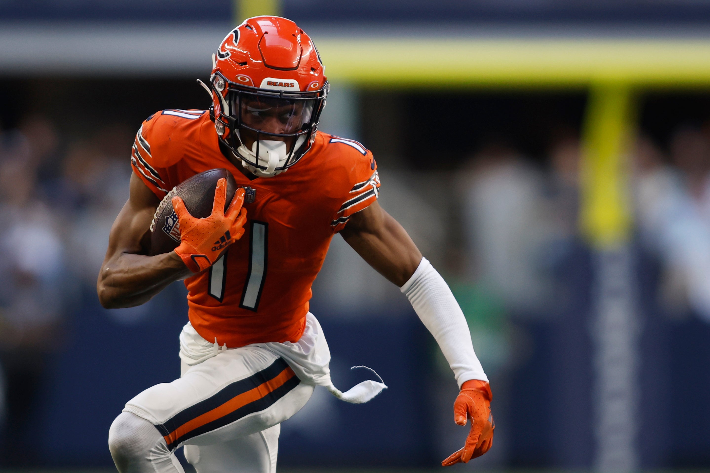 Oct 30, 2022; Arlington, Texas, USA; Chicago Bears wide receiver Darnell Mooney (11) runs for a first down in the third quarter against the Dallas Cowboys at AT&T Stadium.