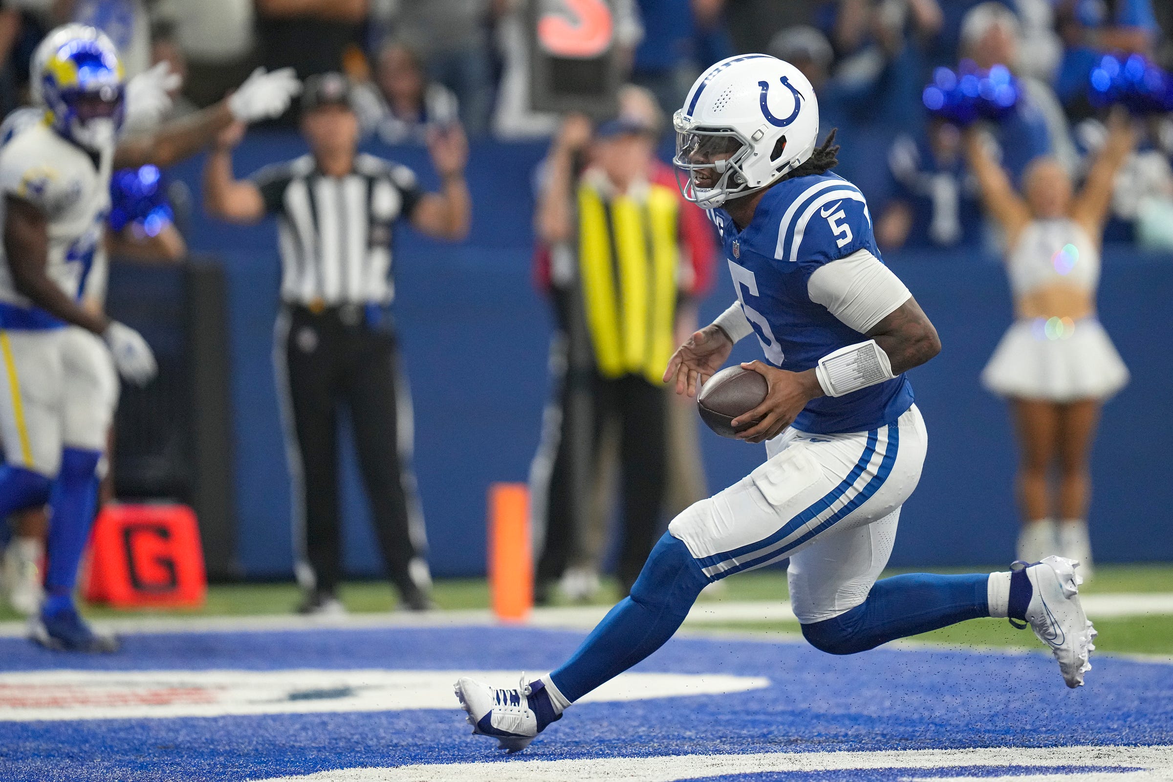 Indianapolis Colts quarterback Anthony Richardson (5) scores a touchdown during the second half of the game against the Los Angeles Rams on Sunday, Oct. 1, 2023, at Lucas Oil Stadium in Indianapolis. The Colts lost in overtime, 29-23.