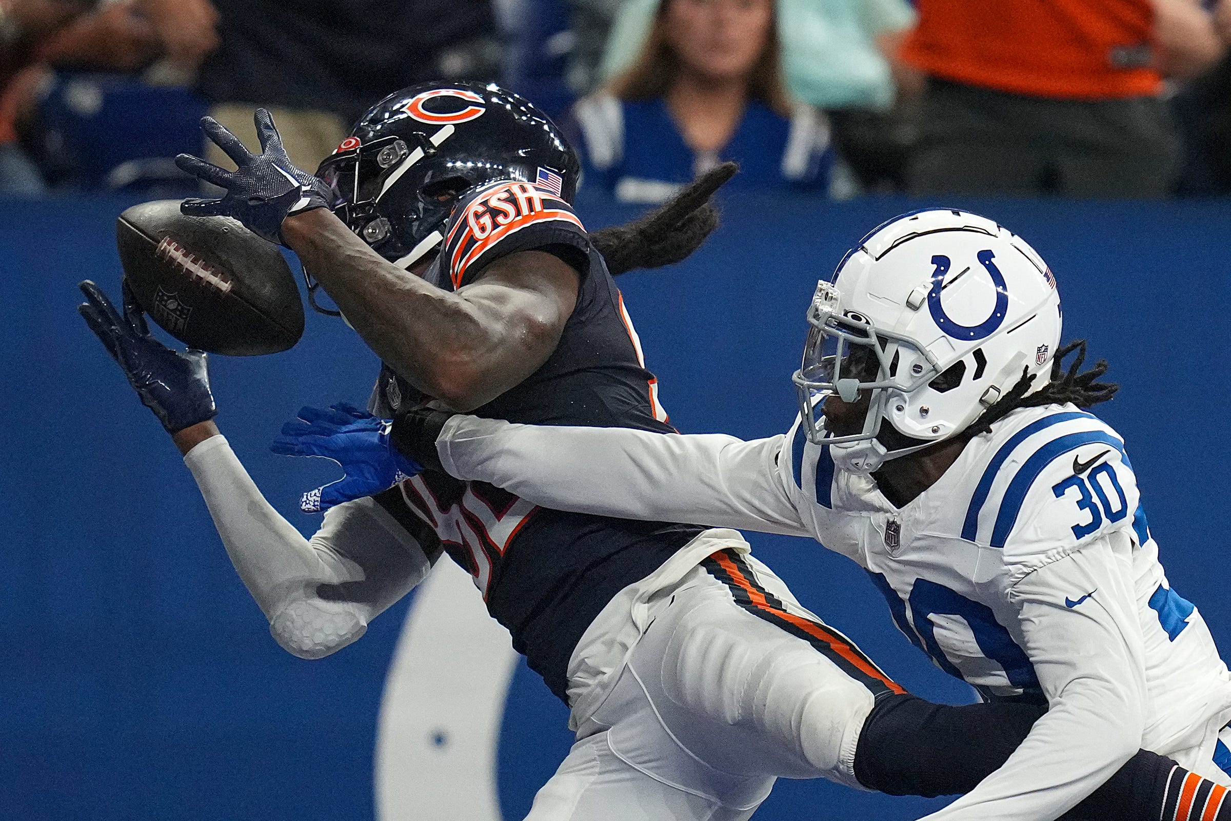 Indianapolis Colts cornerback Darius Rush (30) is unable to stop a touchdown reception by Chicago Bears wide receiver Daurice Fountain (82) during the second half of an NFL preseason game Saturday, Aug. 19, 2023, at Lucas Oil Stadium in Indianapolis. The Colts defeated the Bears, 24-17.