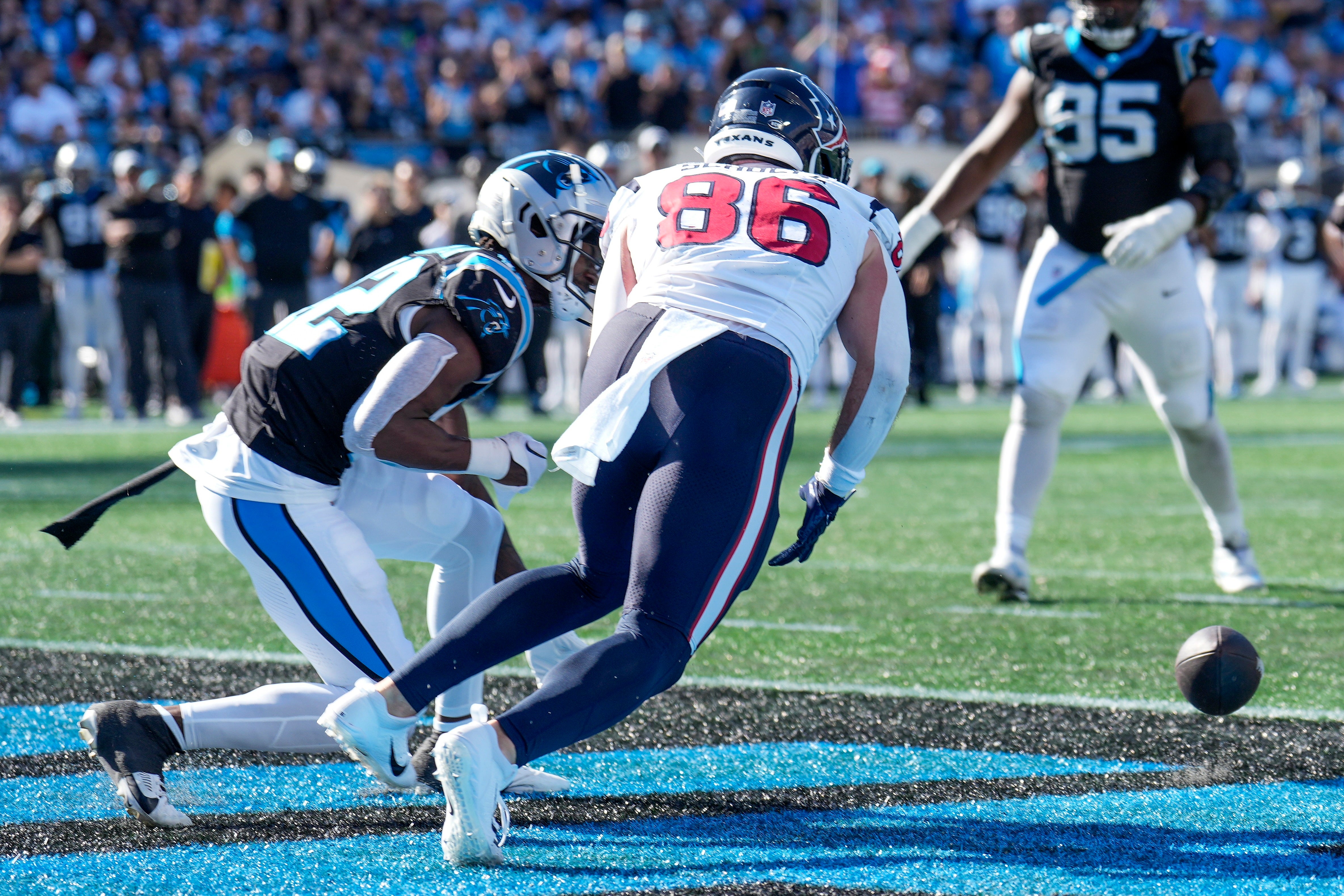 Oct 29, 2023; Charlotte, North Carolina, USA; A pass to Houston Texans tight end Dalton Schultz (86) is broken up by Carolina Panthers safety Jammie Robinson (22) during the second half at Bank of America Stadium. Mandatory Credit: Jim Dedmon-USA TODAY Sports
