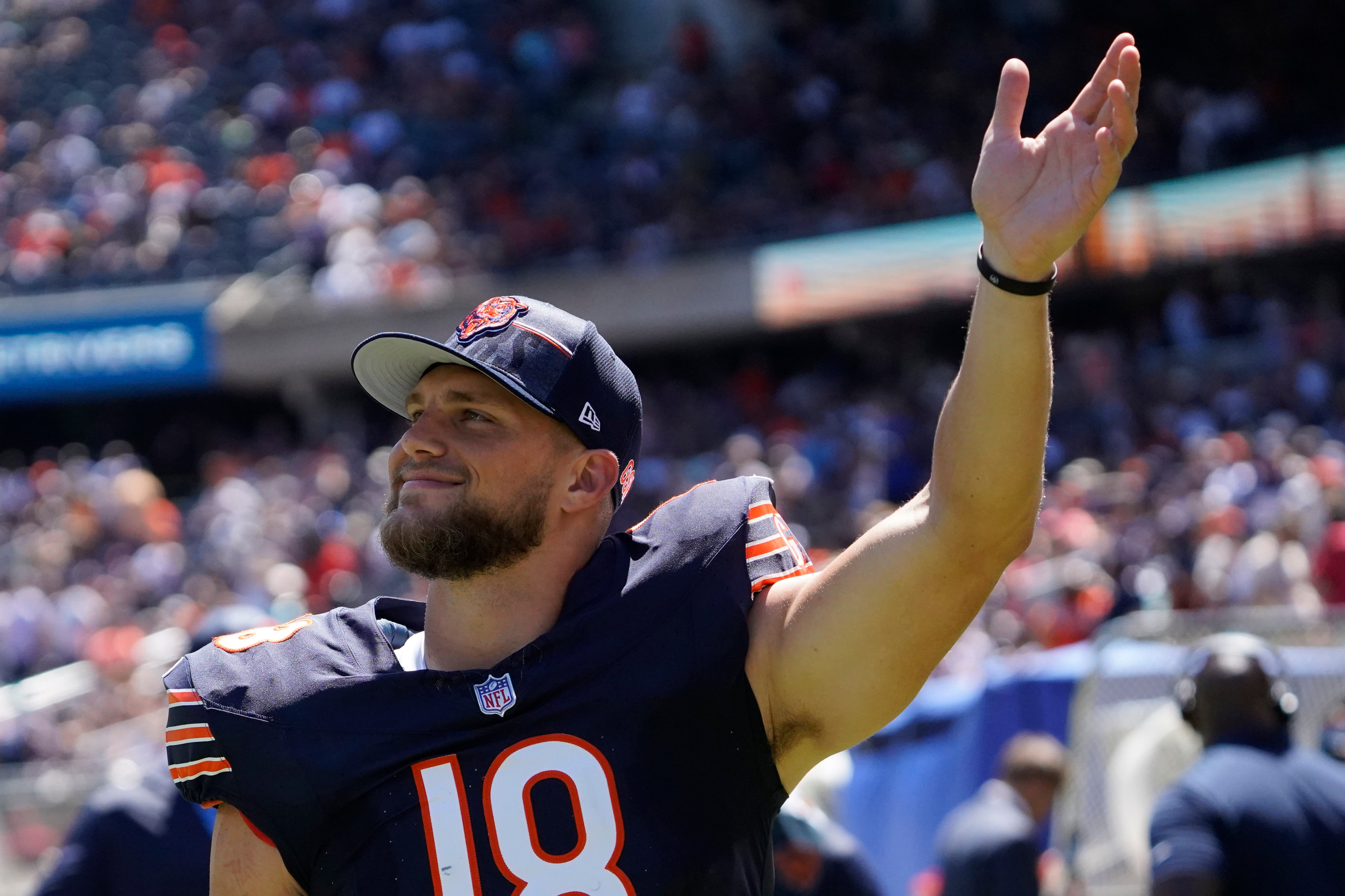 Aug 12, 2023; Chicago, Illinois, USA; Chicago Bears tight end Robert Tonyan (18) leaves the field at halftime during the second quarter at Soldier Field.
