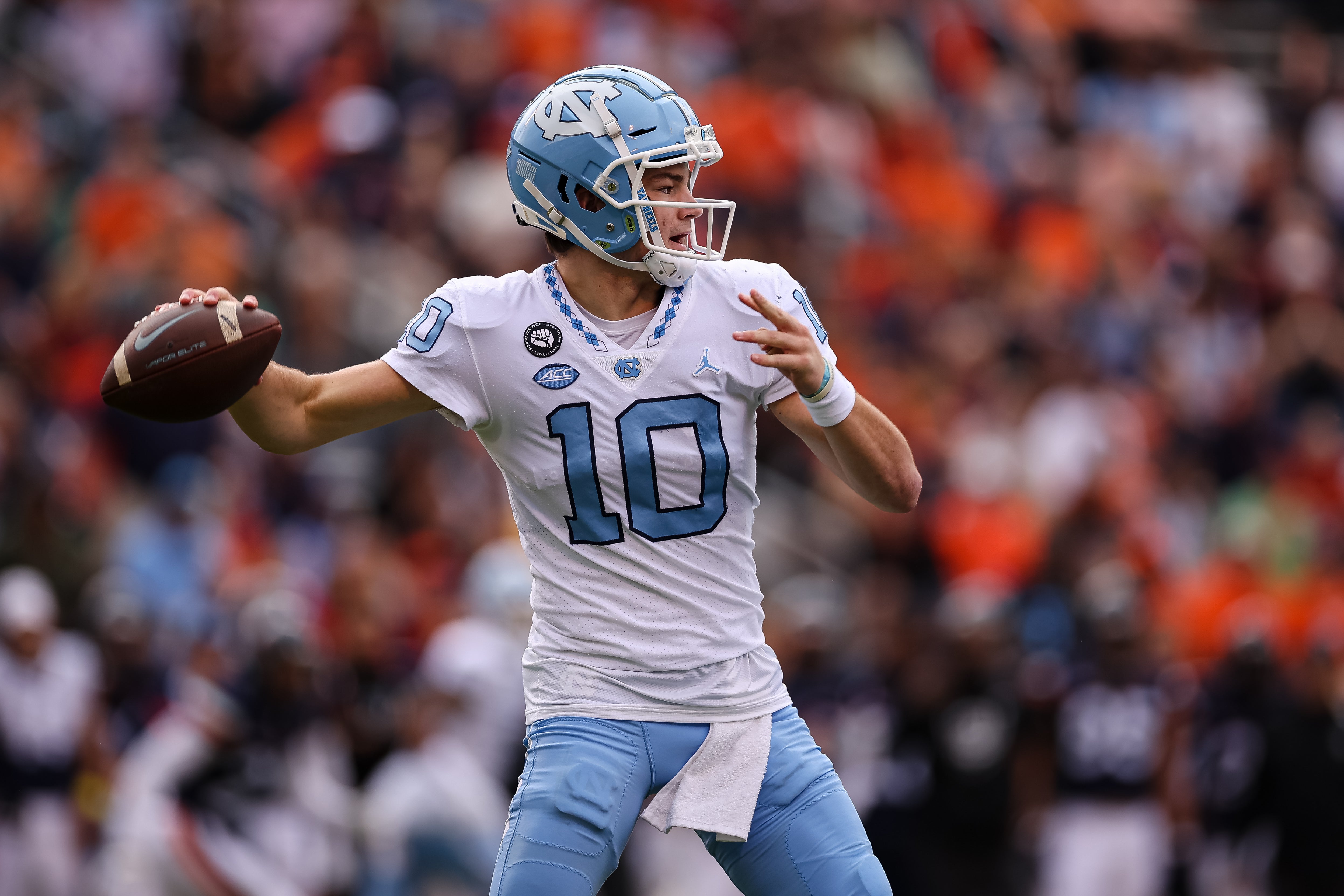Nov 5, 2022; Charlottesville, Virginia, USA; North Carolina Tar Heels quarterback Drake Maye (10) looks to pass against the Virginia Cavaliers during the first half at Scott Stadium.