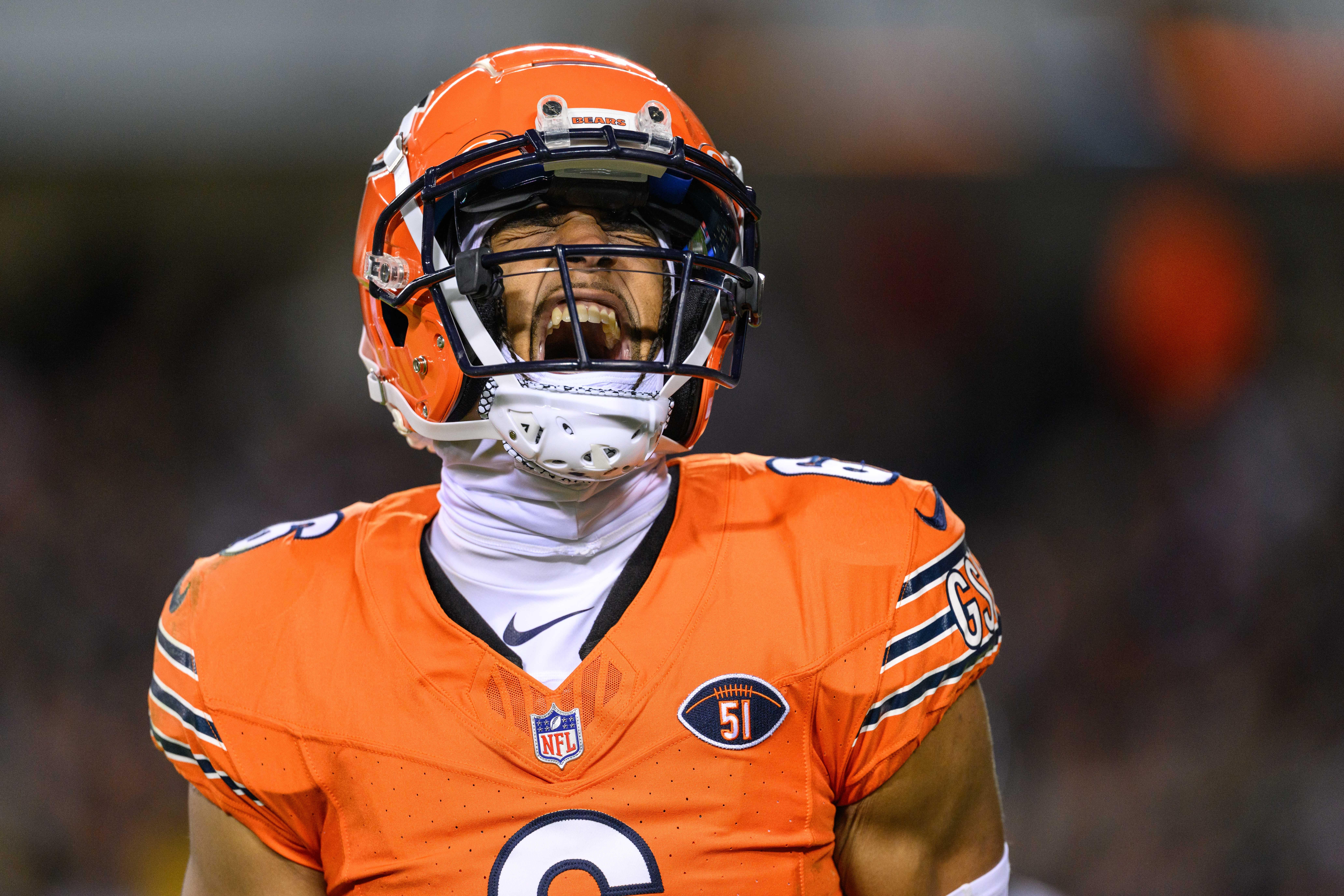 Nov 9, 2023; Chicago, Illinois, USA; Chicago Bears defensive back Kyler Gordon (6) celebrates a defensive play against the Carolina Panthers during the second quarter at Soldier Field.