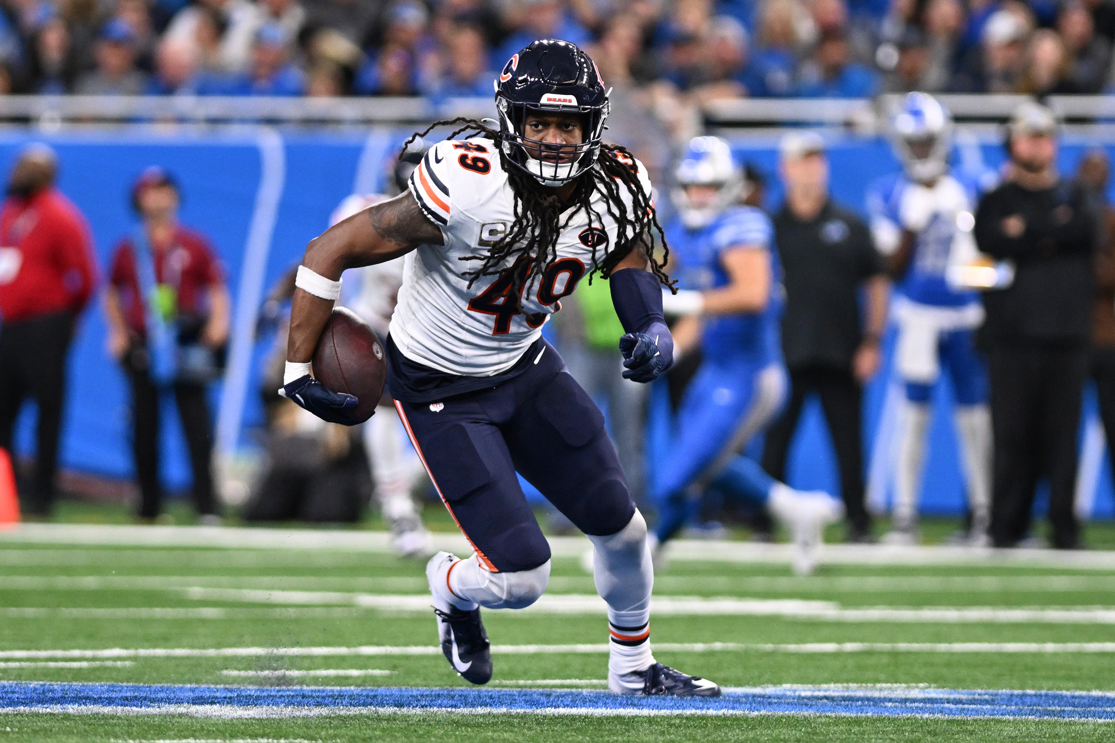Nov 19, 2023; Detroit, Michigan, USA; Chicago Bears linebacker Tremaine Edmunds (49) runs with the ball after intercepting a pass against the Detroit Lions in the third quarter at Ford Field.