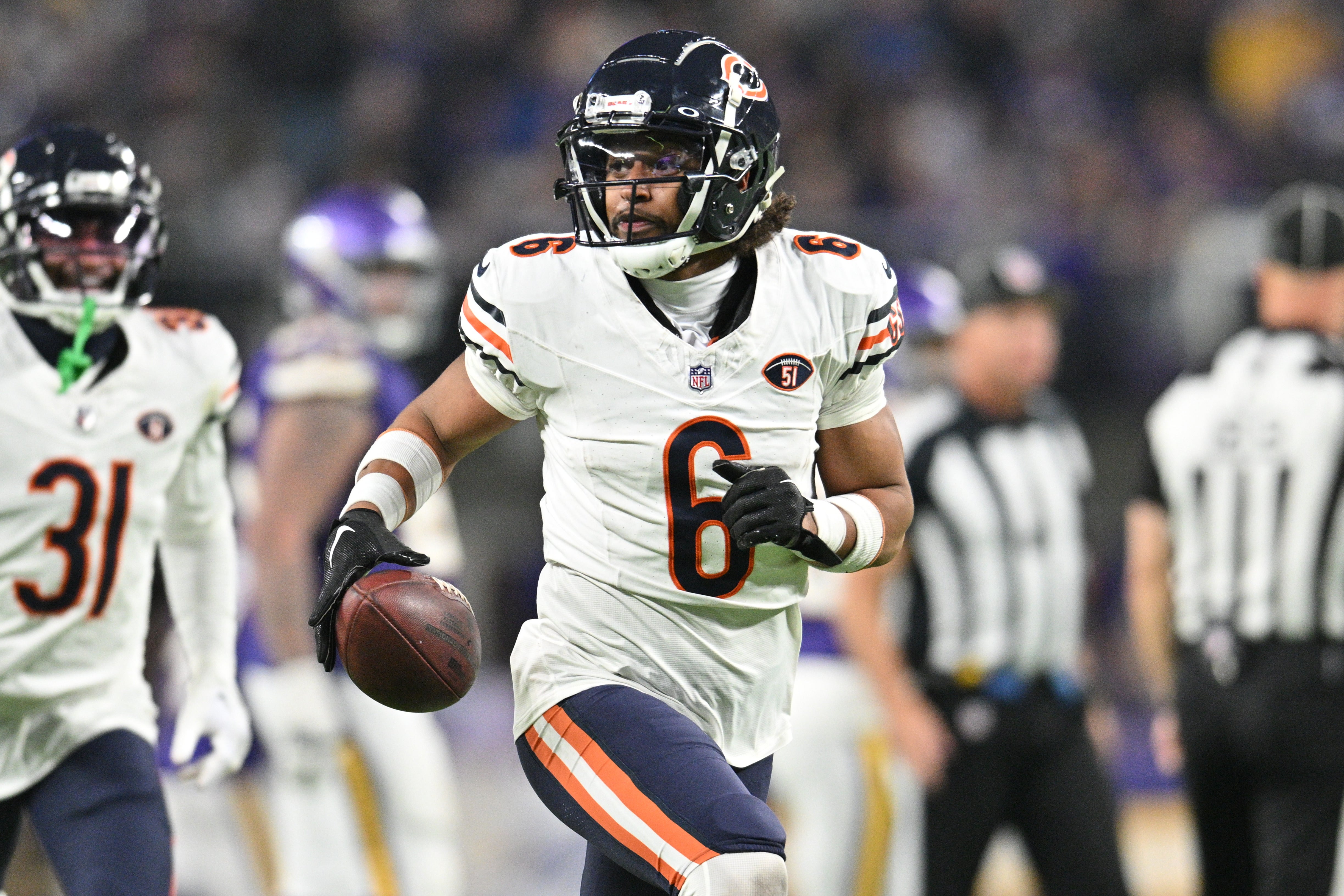 Nov 27, 2023; Minneapolis, Minnesota, USA; Chicago Bears cornerback Kyler Gordon (6) reacts after an interception off Minnesota Vikings quarterback Joshua Dobbs (not pictured) during the fourth quarter at U.S. Bank Stadium.
