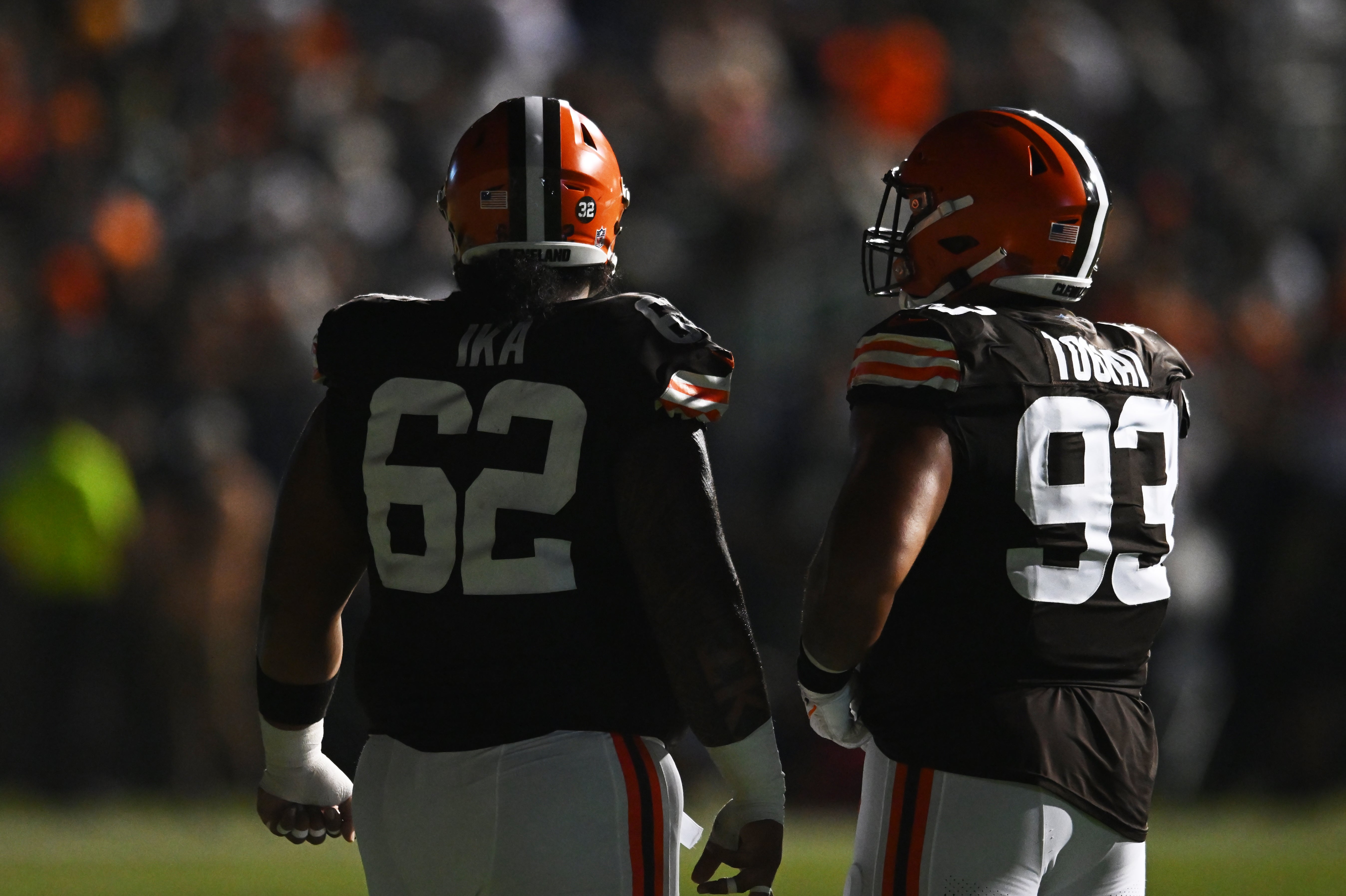 Aug 3, 2023; Canton, Ohio, USA; Cleveland Browns defensive tackle Siaki Ika (62) and defensive tackle Tommy Togiai (93) wait during a power outage in the second half of the game between the Cleveland Browns and the New York Jets at Tom Benson Hall of Fame Stadium. Mandatory Credit: Ken Blaze-USA TODAY Sports