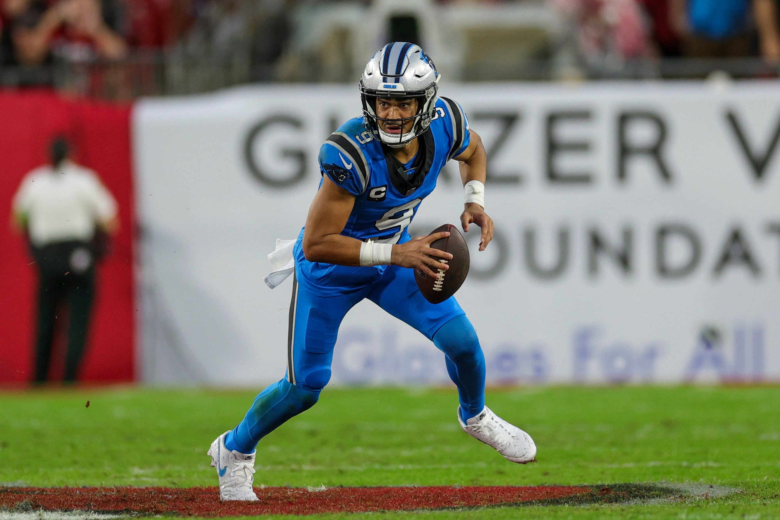 Dec 3, 2023; Tampa, Florida, USA; Carolina Panthers quarterback Bryce Young (9) runs with the ball against the Tampa Bay Buccaneers in the third quarter at Raymond James Stadium. Mandatory Credit: Nathan Ray Seebeck-USA TODAY Sports