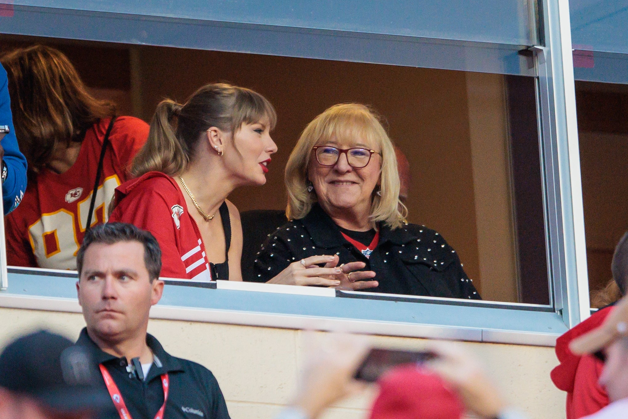 Grammy award-winning artist Taylor Swift watches Kansas City Chiefs take the field along with Kansas City Chiefs tight end Travis Kelce mom Donna Kelce prior to the game against the Denver Broncos at GEHA Field at Arrowhead Stadium