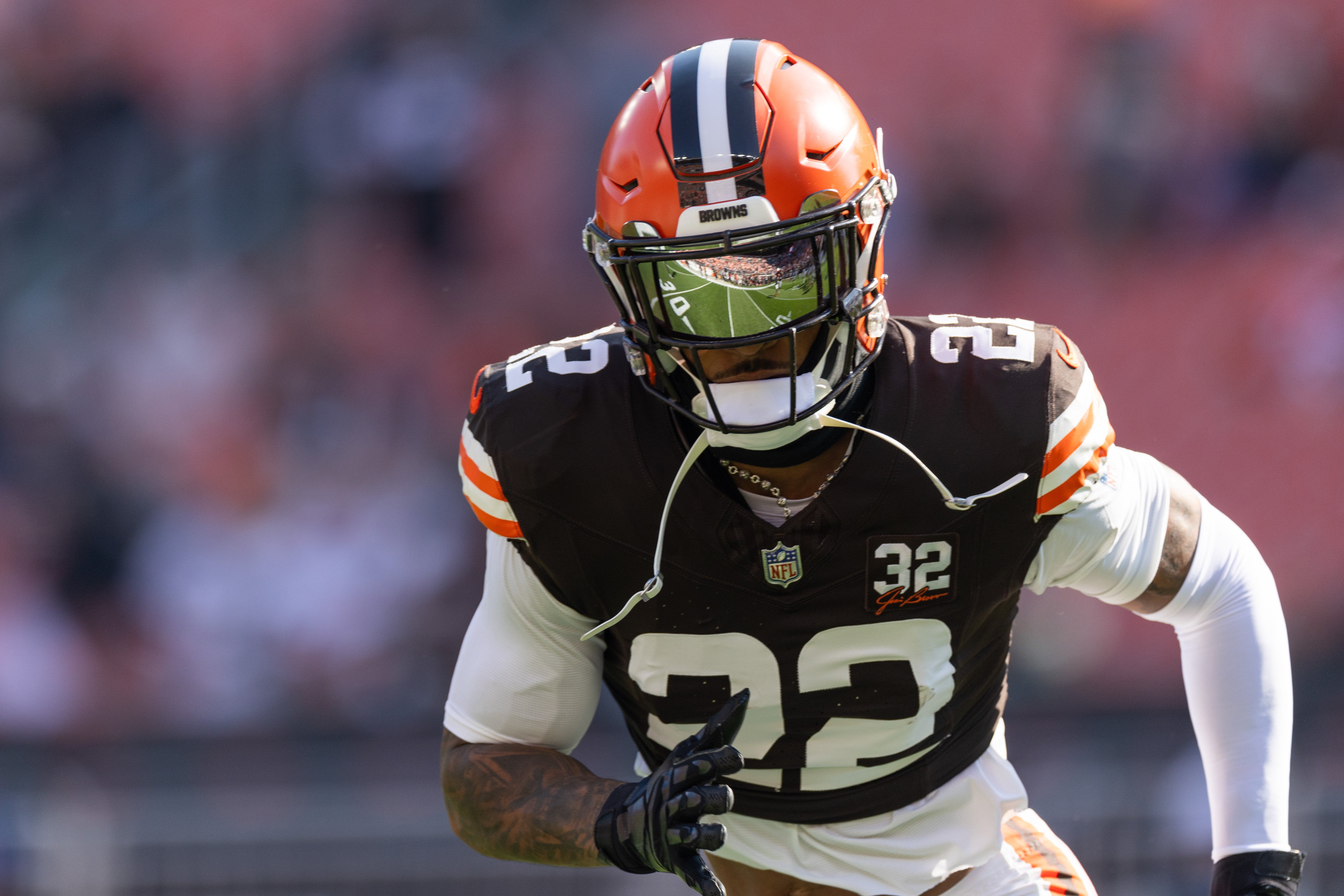 Nov 5, 2023; Cleveland, Ohio, USA; The field is reflected in the visor of Cleveland Browns safety Grant Delpit (22) during warm ups before the game against the Arizona Cardinals at Cleveland Browns Stadium. Mandatory Credit: Scott Galvin-USA TODAY Sports