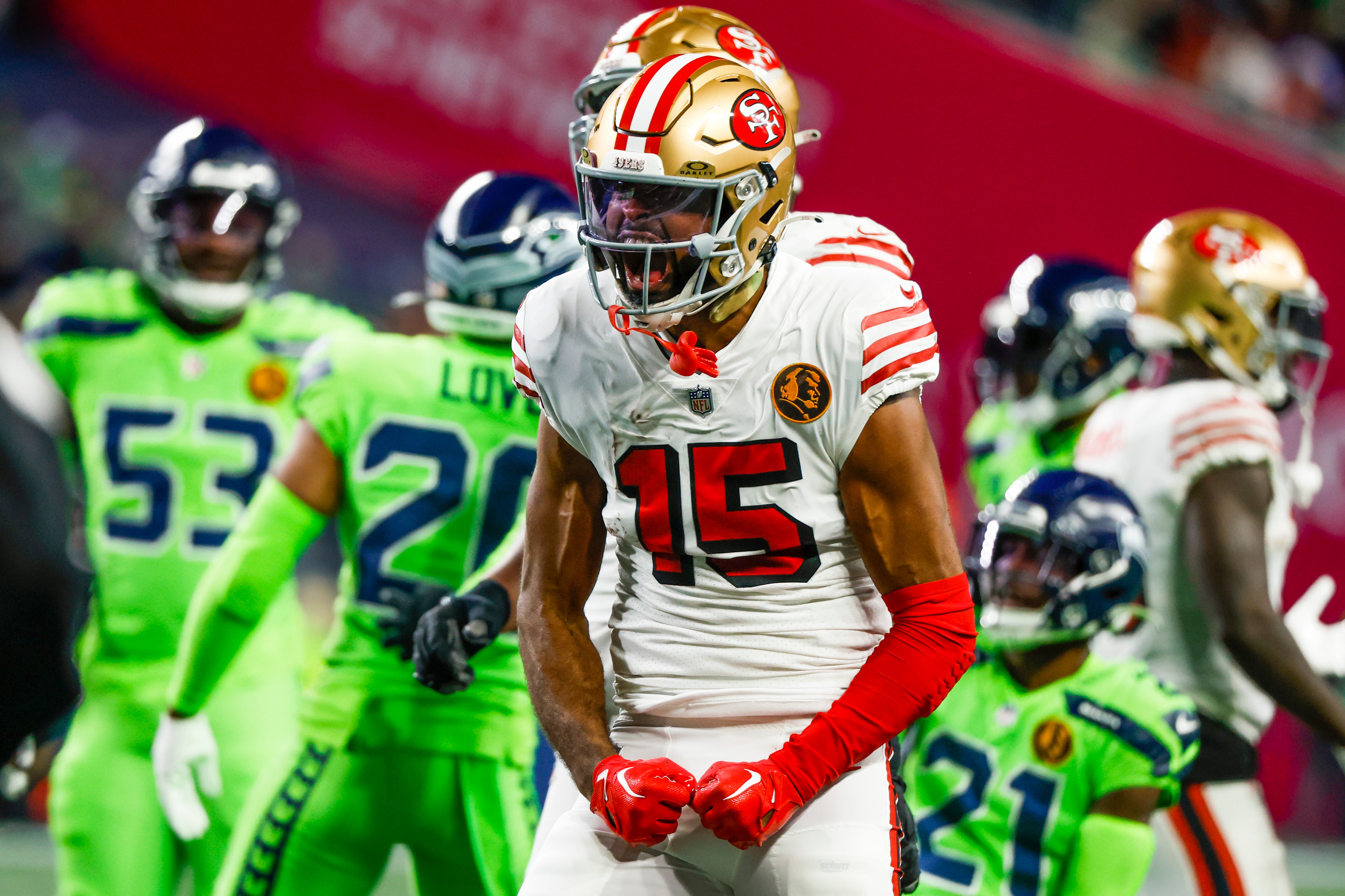 Nov 23, 2023; Seattle, Washington, USA; San Francisco 49ers wide receiver Jauan Jennings (15) reacts after a reception for a first down against the Seattle Seahawks during the first quarter at Lumen Field.
