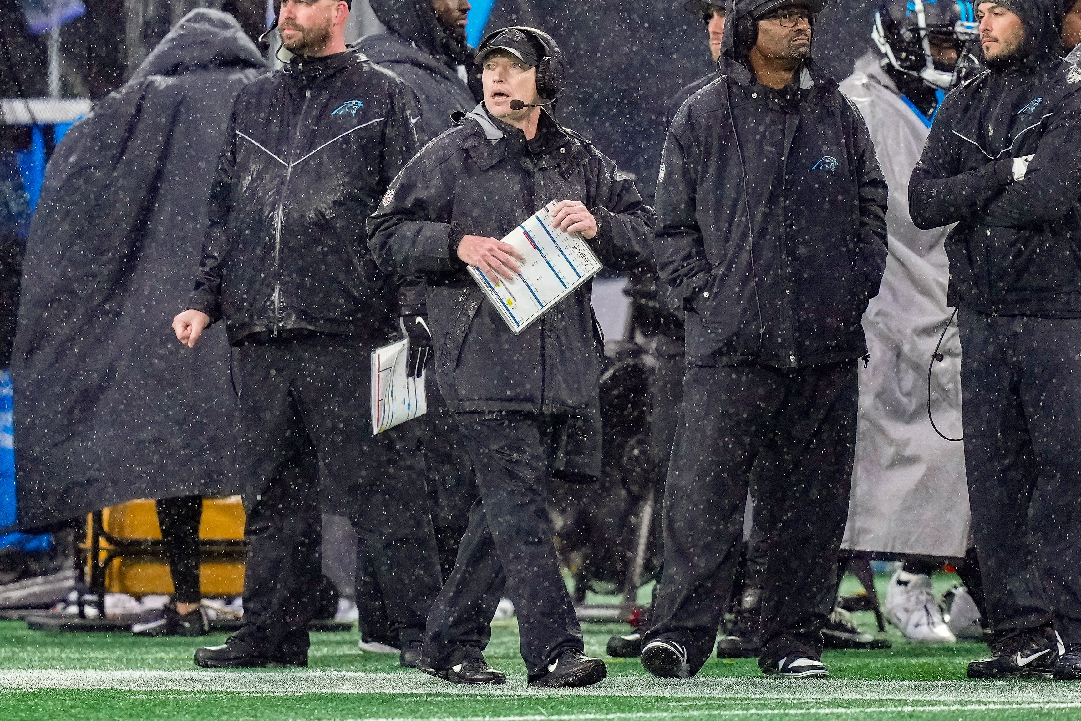 Dec 17, 2023; Charlotte, North Carolina, USA; Carolina Panthers interim head coach Chris Tabor walks the sideline during the second quarter against the Atlanta Falcons at Bank of America Stadium. Mandatory Credit: Jim Dedmon-USA TODAY Sports