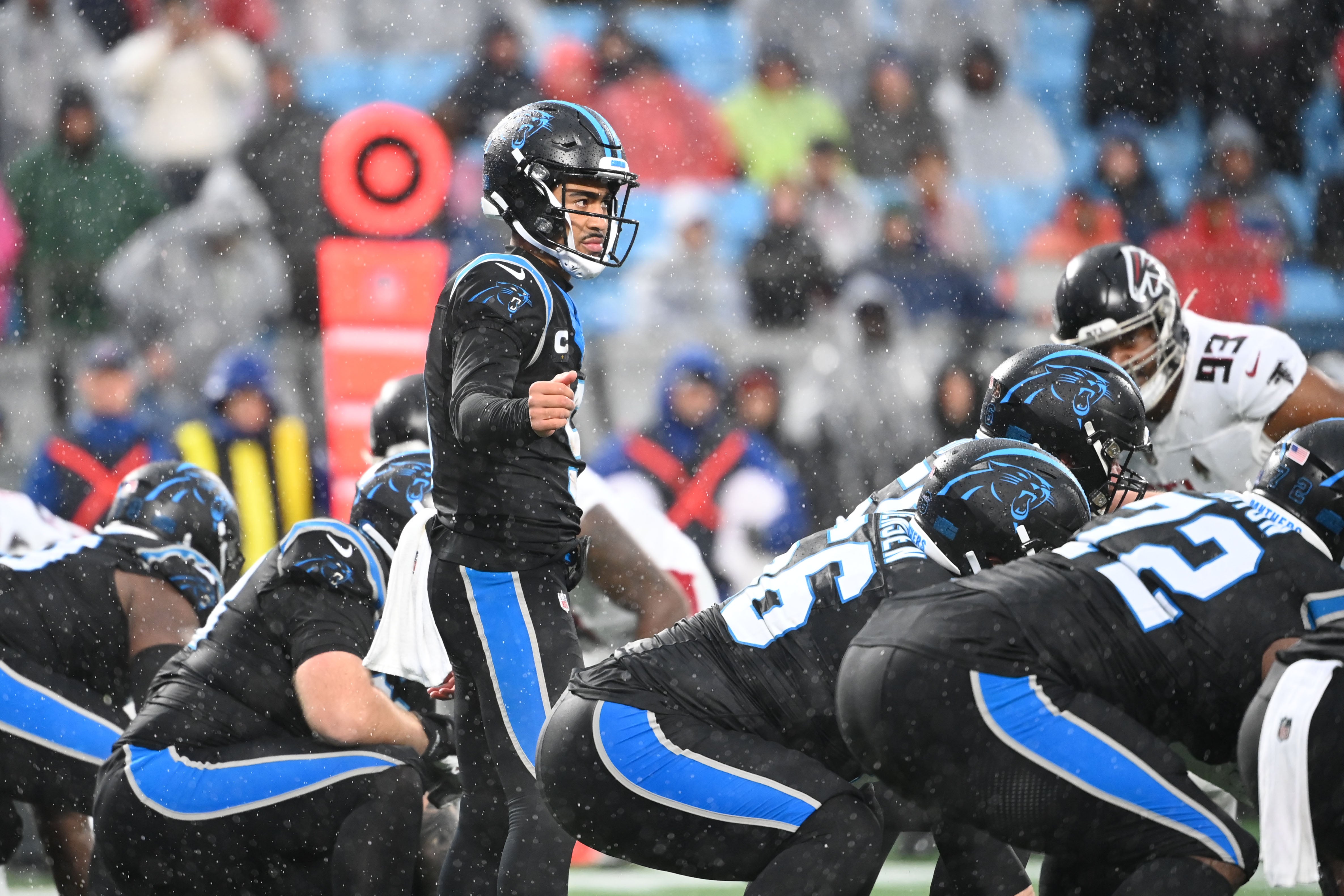 Dec 17, 2023; Charlotte, North Carolina, USA; Carolina Panthers quarterback Bryce Young (9) at the line of scrimmage in the second quarter at Bank of America Stadium. Mandatory Credit: Bob Donnan-USA TODAY Sports