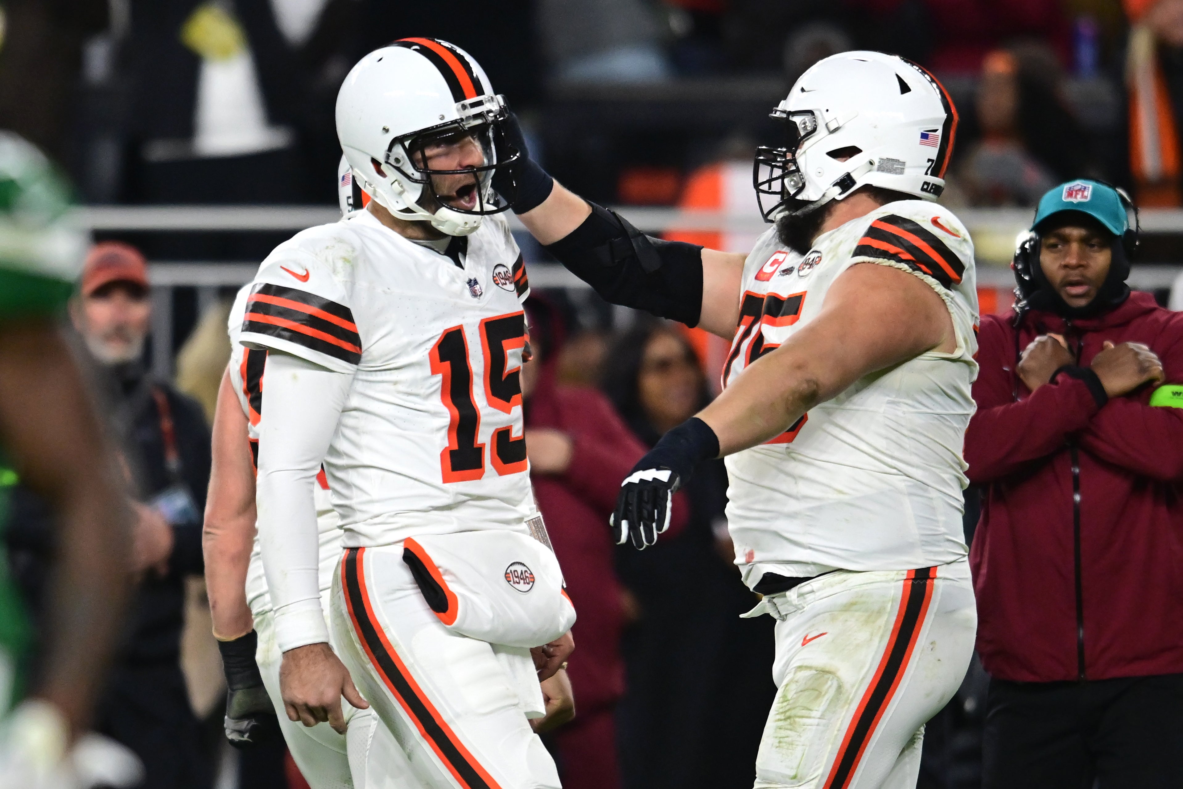Dec 28, 2023; Cleveland, Ohio, USA; Cleveland Browns quarterback Joe Flacco (15) celebrates with guard Joel Bitonio (75) after a touchdown pass against the New York Jets during the first half at Cleveland Browns Stadium. Mandatory Credit: Ken Blaze-USA TODAY Sports