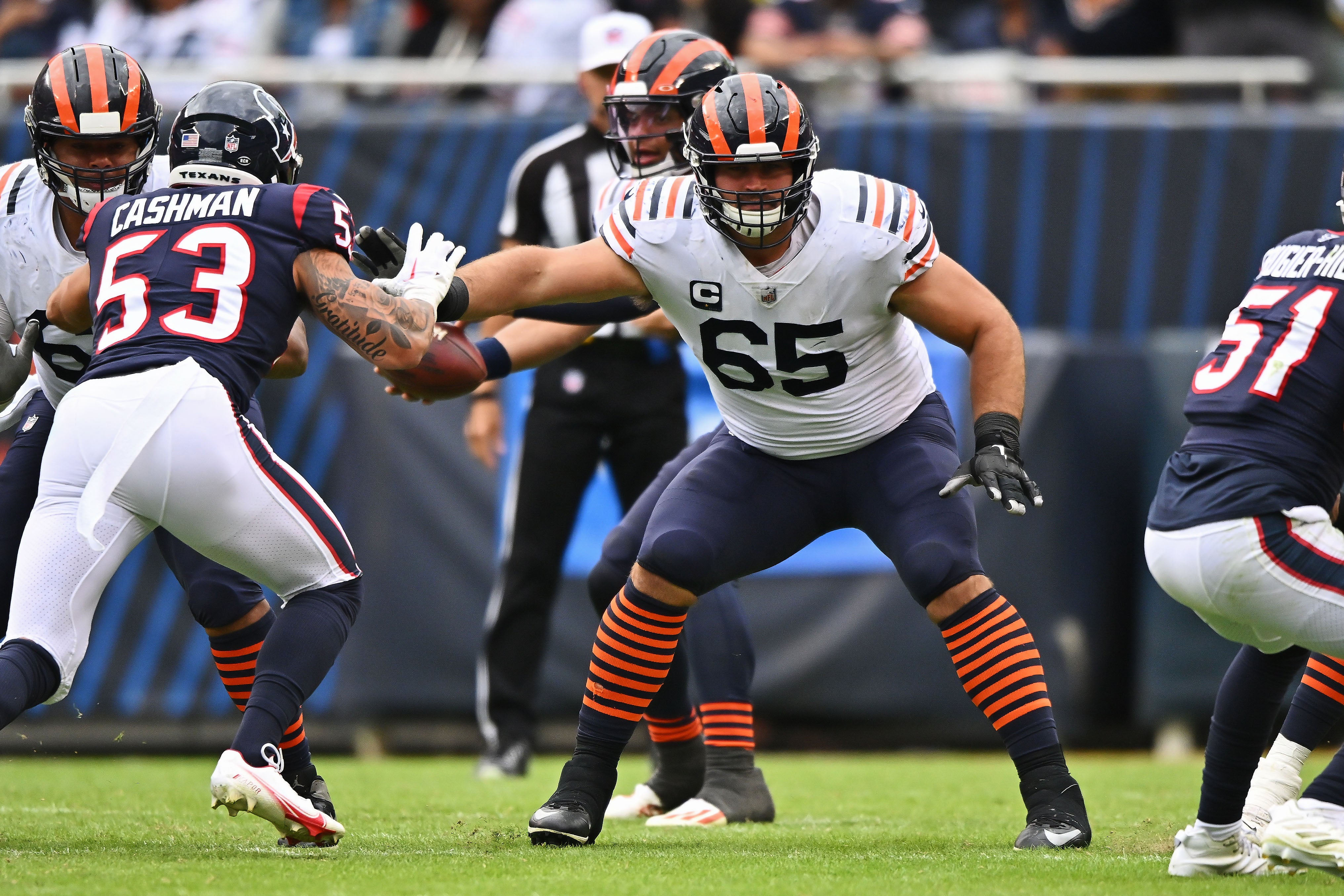 Sep 25, 2022; Chicago, Illinois, USA; Chicago Bears offensive lineman Cody Whitehair (65) blocks against the Houston Texans at Soldier Field. Chicago defeated Houston 23-20.