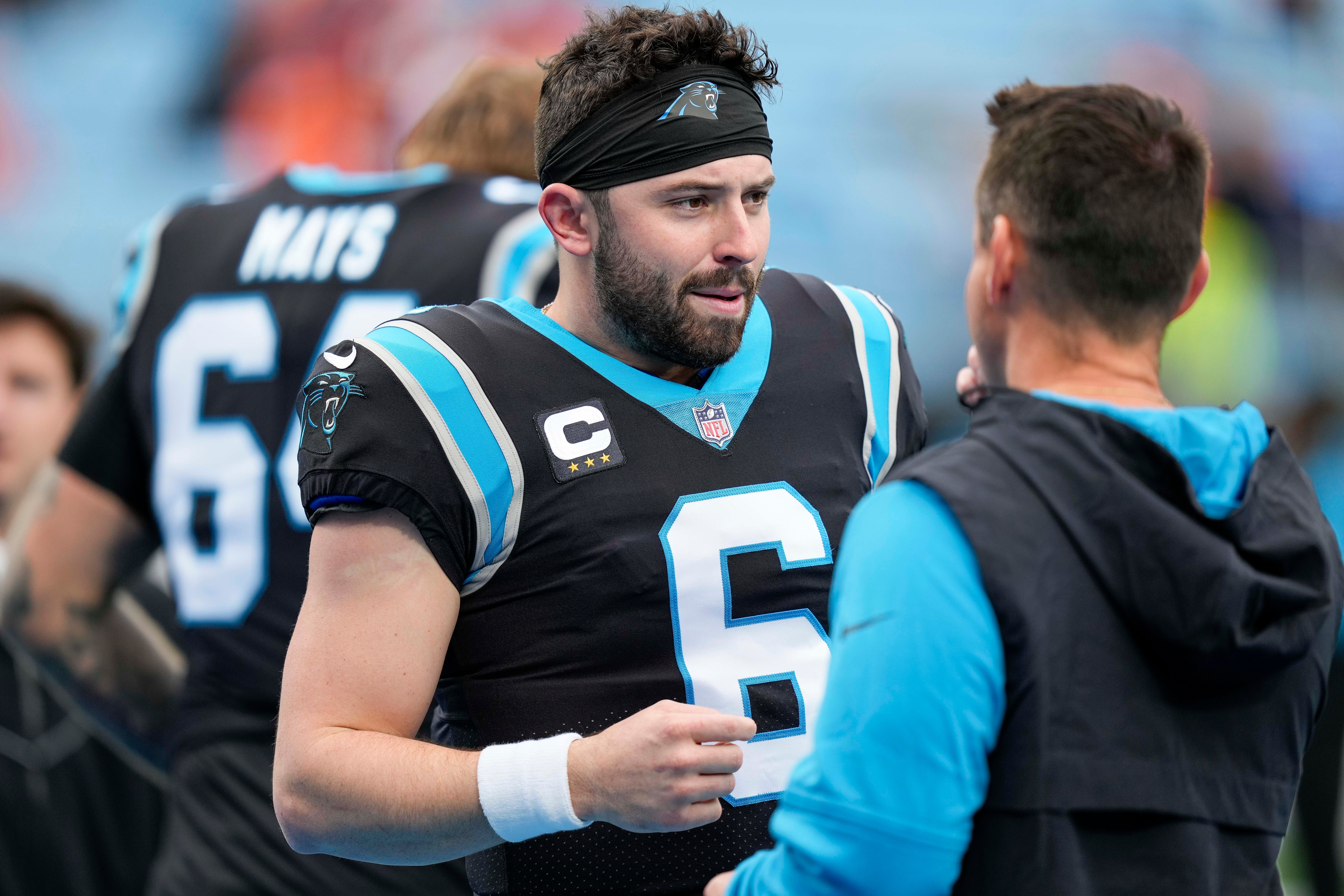 Nov 27, 2022; Charlotte, North Carolina, USA; Carolina Panthers quarterback Baker Mayfield (6) looks on during pregame warmups against the Denver Broncos at Bank of America Stadium. Mandatory Credit: Jim Dedmon-USA TODAY Sports