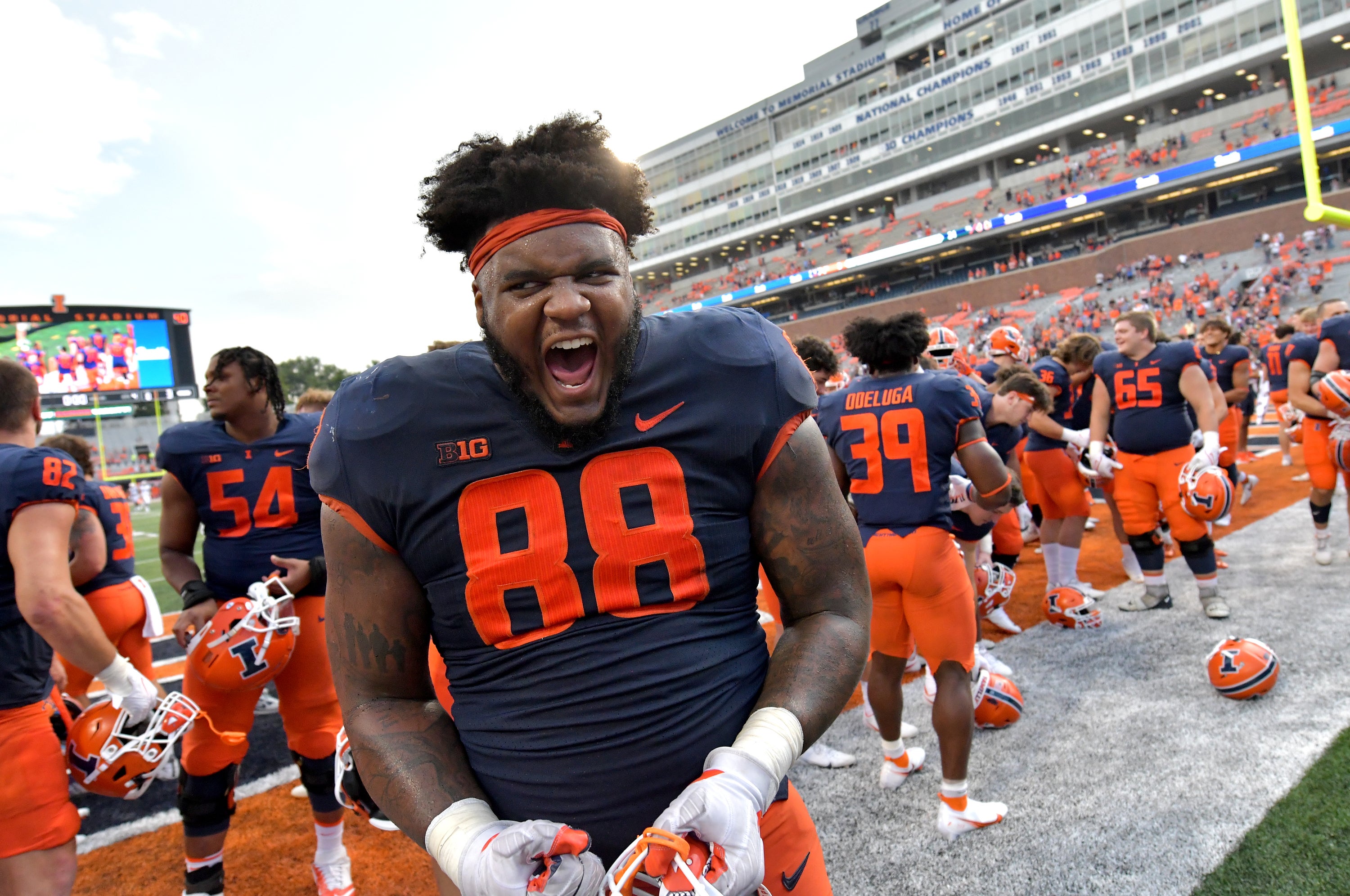 Sep 10, 2022; Champaign, Illinois, USA; Illinois Fighting Illini defensive lineman Keith Randolph Jr. (88) reacts after Saturday's 24-3 win over the Virginia Cavaliers at Memorial Stadium.