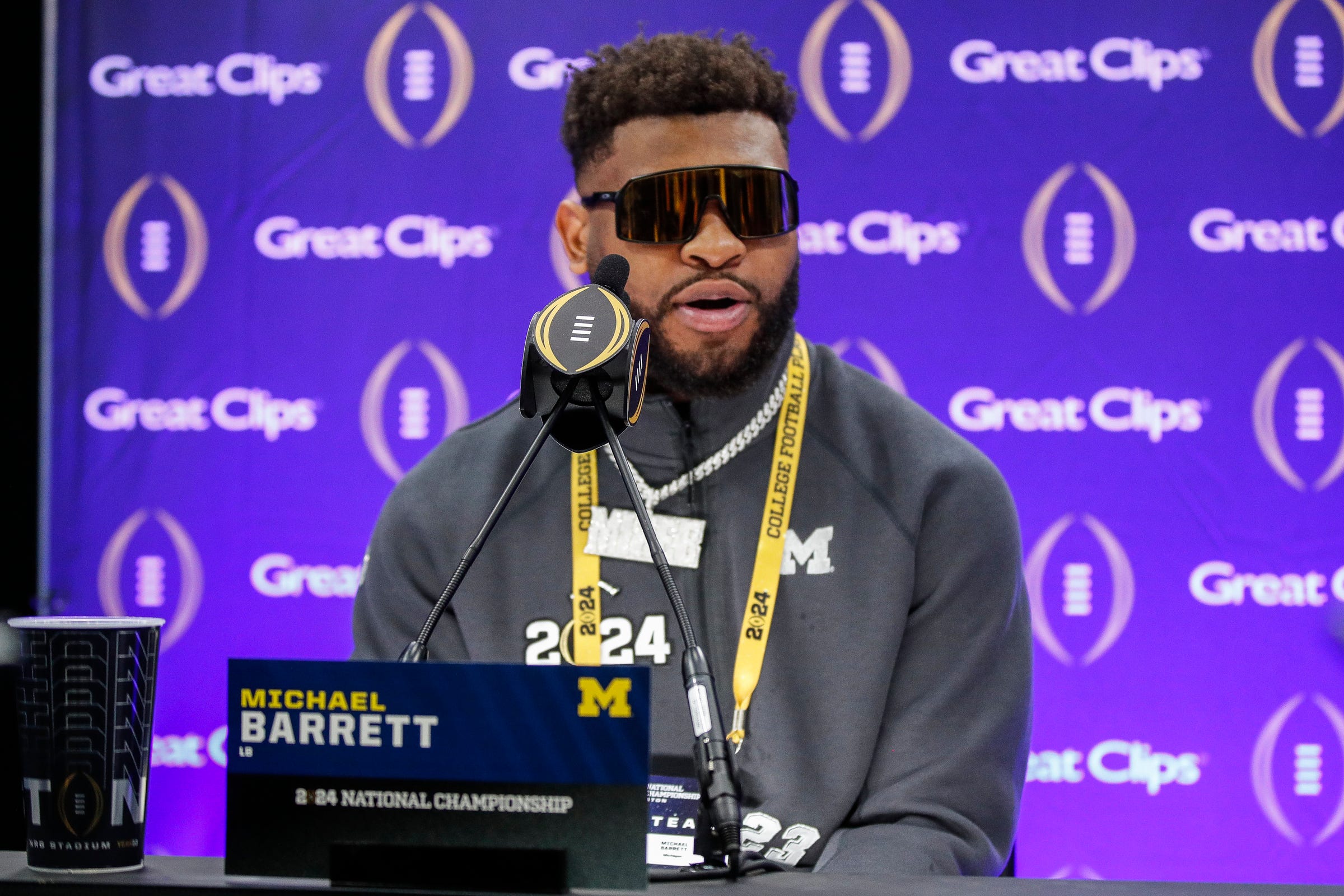 Michigan linebacker Michael Barrett (23) speaks during Media Day at George R. Brown Convention Center in Houston, Texas on Saturday, Jan. 6, 2024.