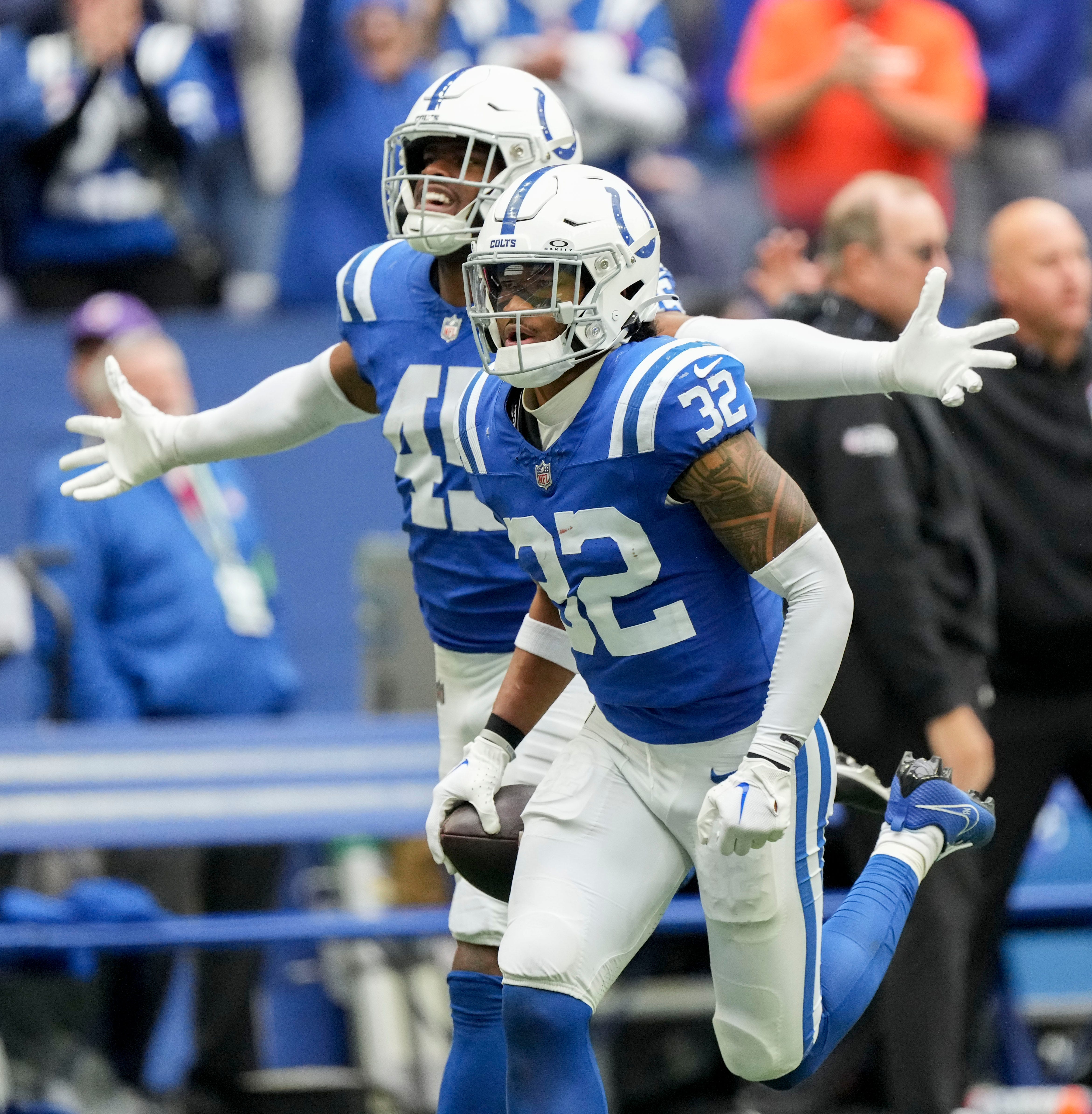 Indianapolis Colts linebacker E.J. Speed (45) celebrates with Indianapolis Colts safety Julian Blackmon (32) after he made an interception to end the game Sunday, Oct. 8, 2023, during a game against the Tennessee Titans at Lucas Oil Stadium in Indianapolis.