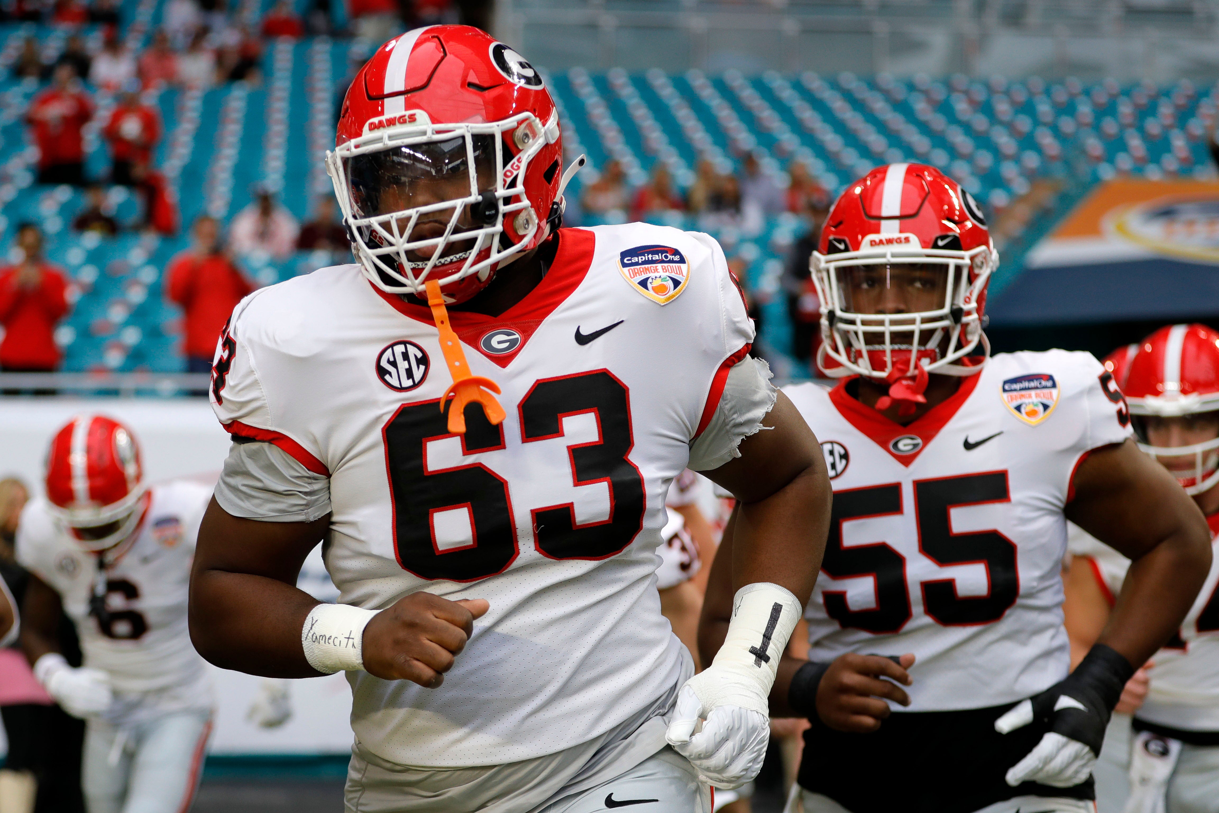 Dec 30, 2023; Miami Gardens, FL, USA; Georgia Bulldogs offensive lineman Sedrick Van Pran (63) takes the field before the game against the Florida State Seminoles for the 2023 Orange Bowl at Hard Rock Stadium.