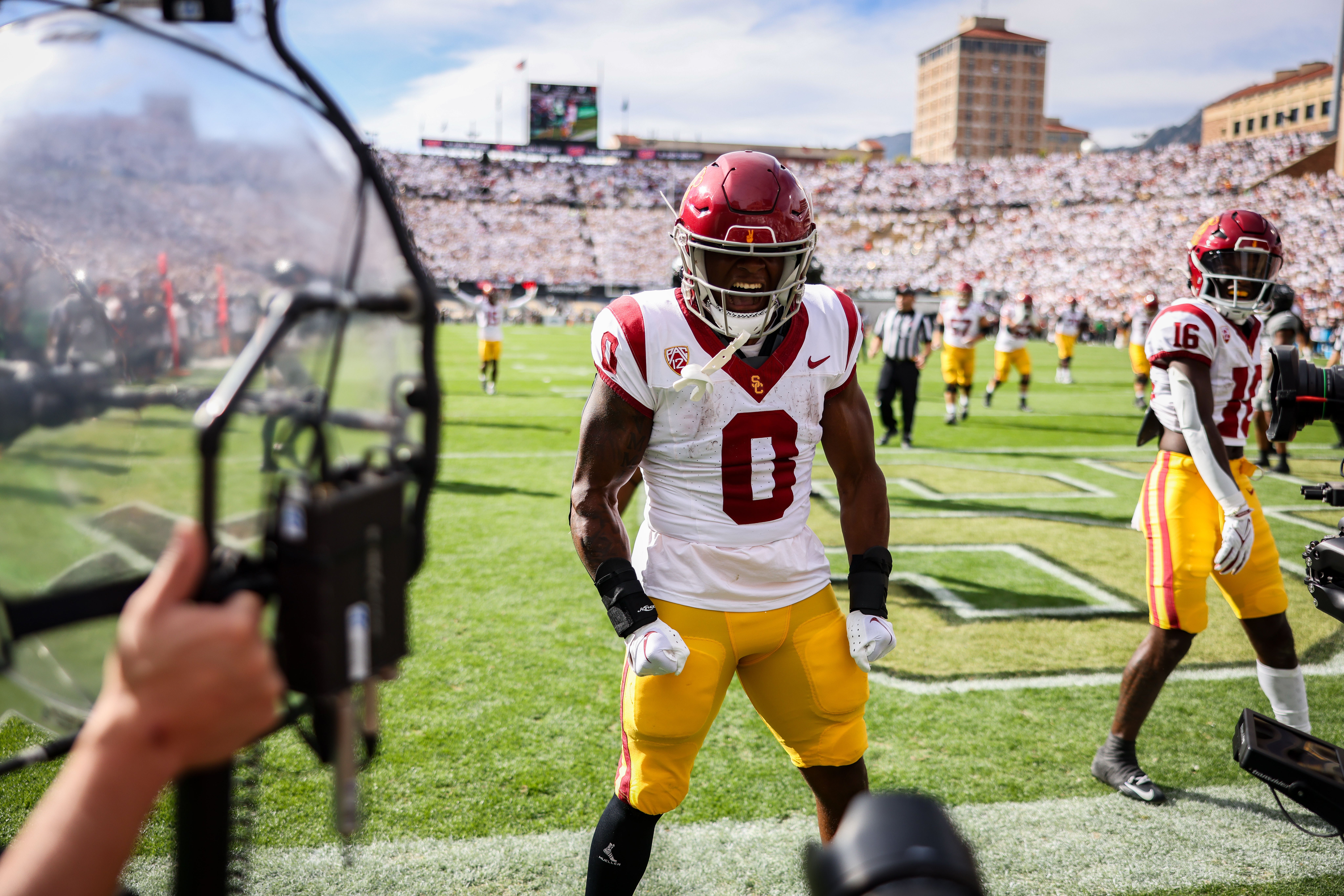 Sep 30, 2023; Boulder, Colorado, USA; USC Trojans running back MarShawn Lloyd (0) celebrates a touchdown in the first quarter during their game against the Colorado Buffaloes at Folsom Field.