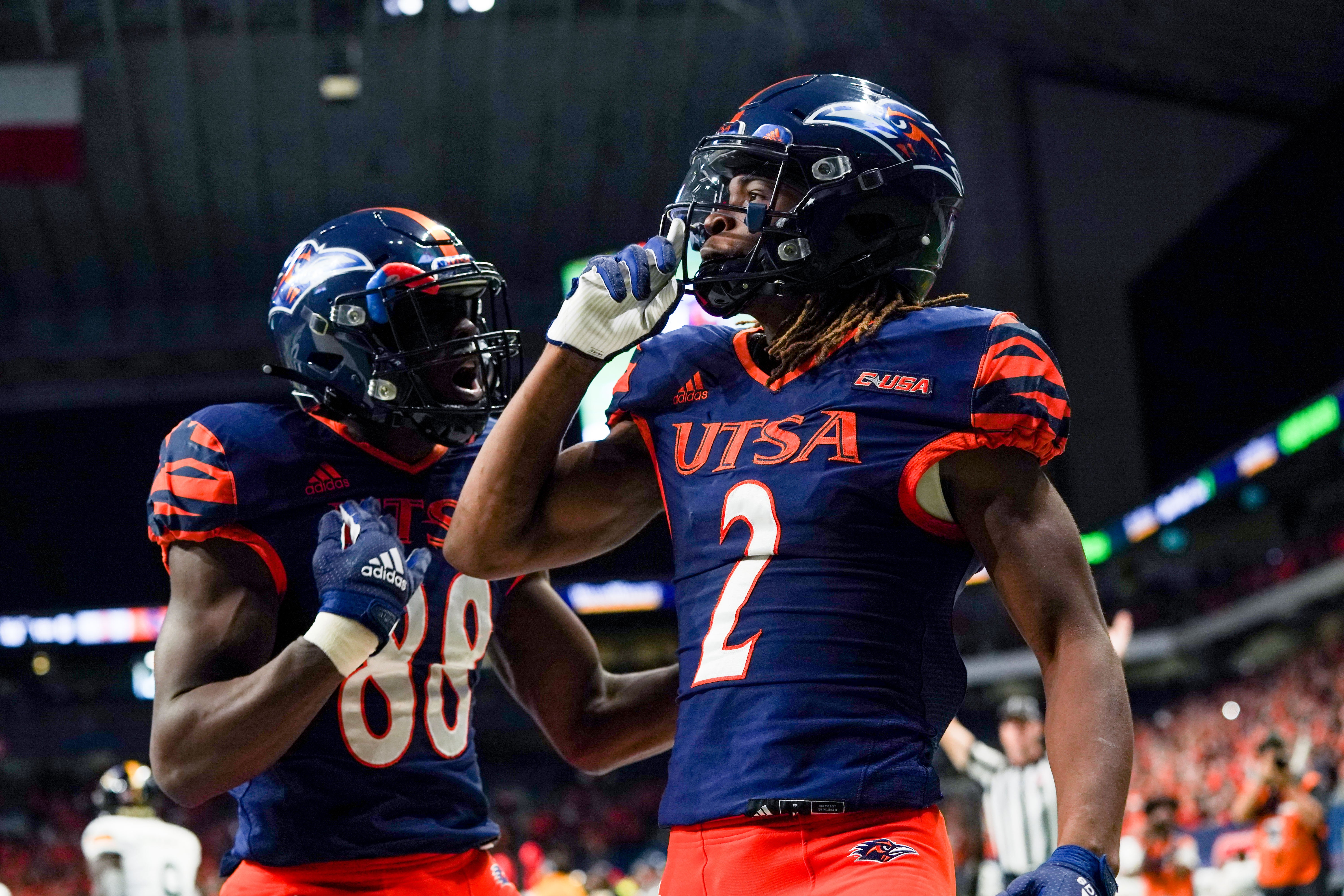 Nov 13, 2021; San Antonio, Texas, USA; UTSA Roadrunners wide receivers Joshua Cephus (2) and De'Corian Clark (88) celebrate Cephus' first half touchdown against the Southern Miss Golden Eagles at the Alamodome.