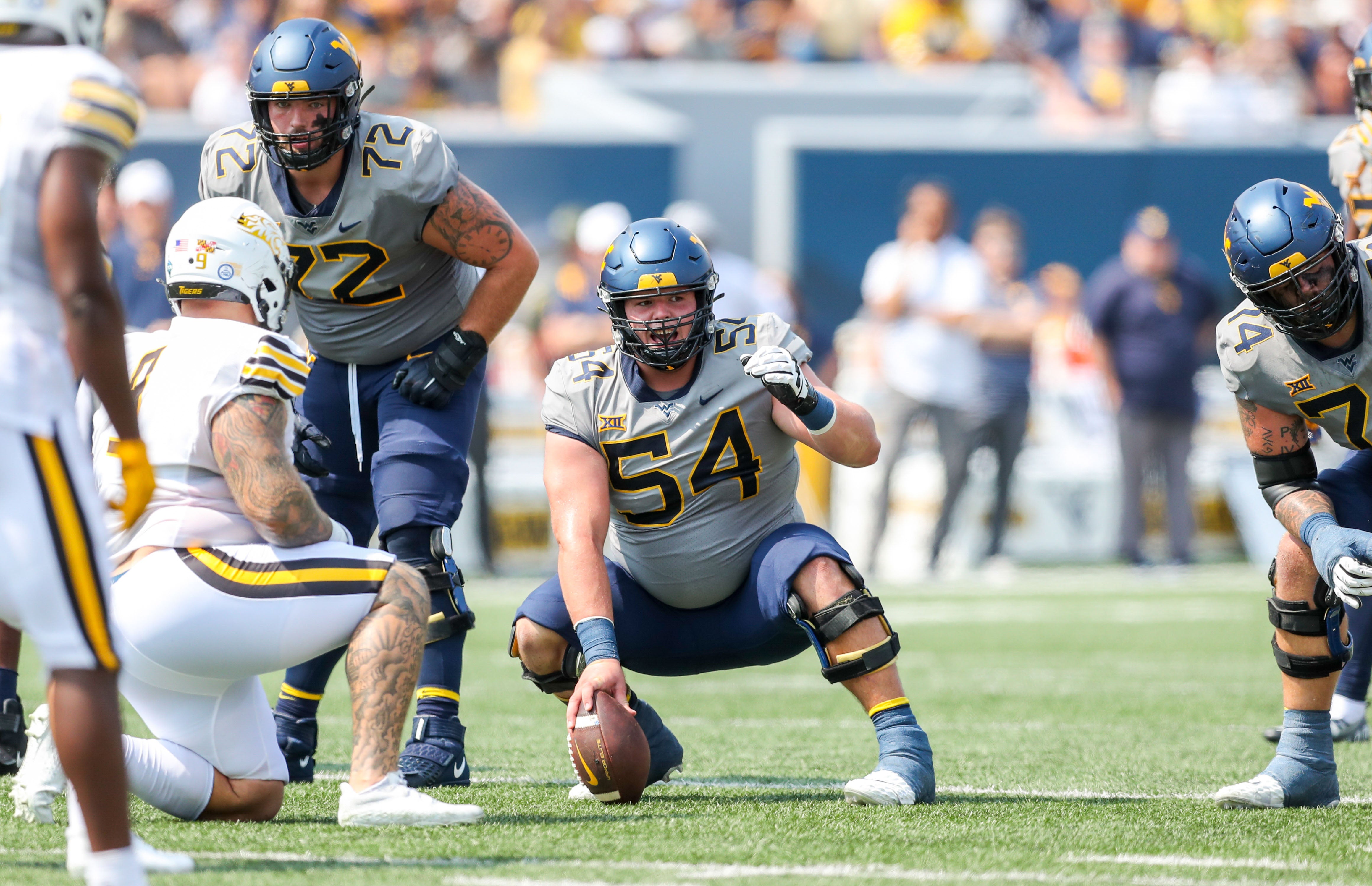 Sep 17, 2022; Morgantown, West Virginia, USA; West Virginia Mountaineers offensive lineman Zach Frazier (54) during the first quarter against the Towson Tigers at Mountaineer Field at Milan Puskar Stadium.