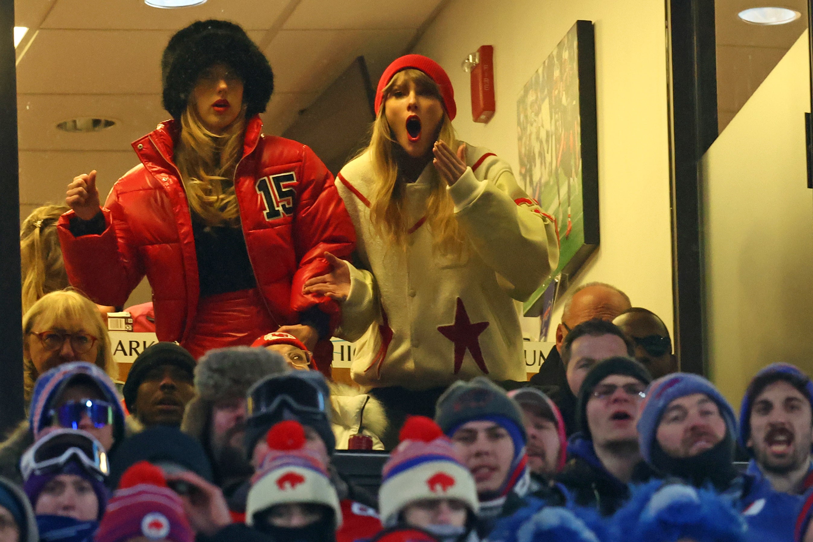Taylor Swift and Brittany Mahomes react after Kansas City Chiefs tight end Travis Kelce  scores a touchdown in the 2024 AFC divisional round game between against the Buffalo Bills at Highmark Stadium