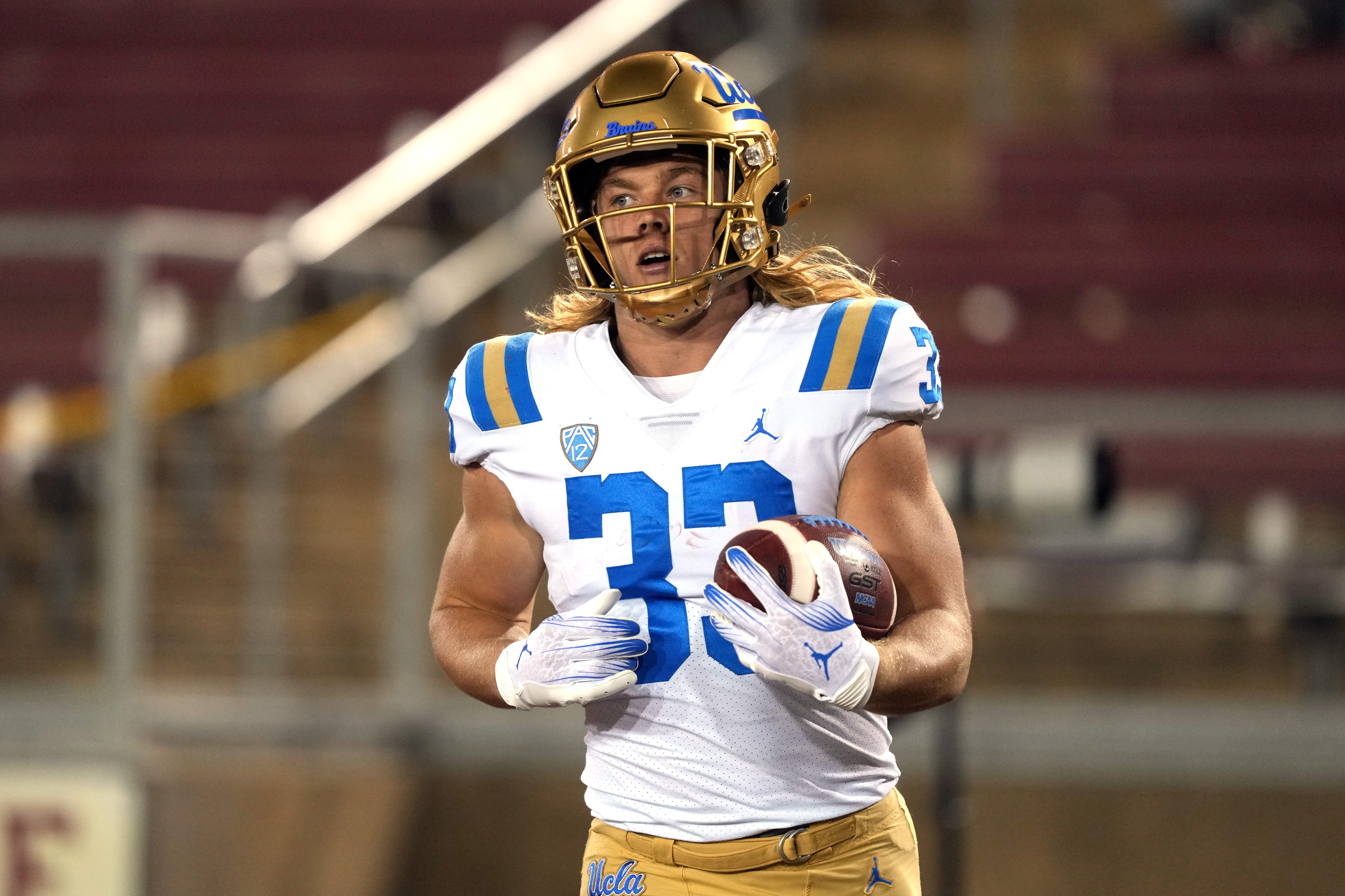 UCLA Bruins running back Carson Steele (33) warms up before the game against the Stanford Cardinal at Stanford Stadium. Darren Yamashita-USA TODAY Sports