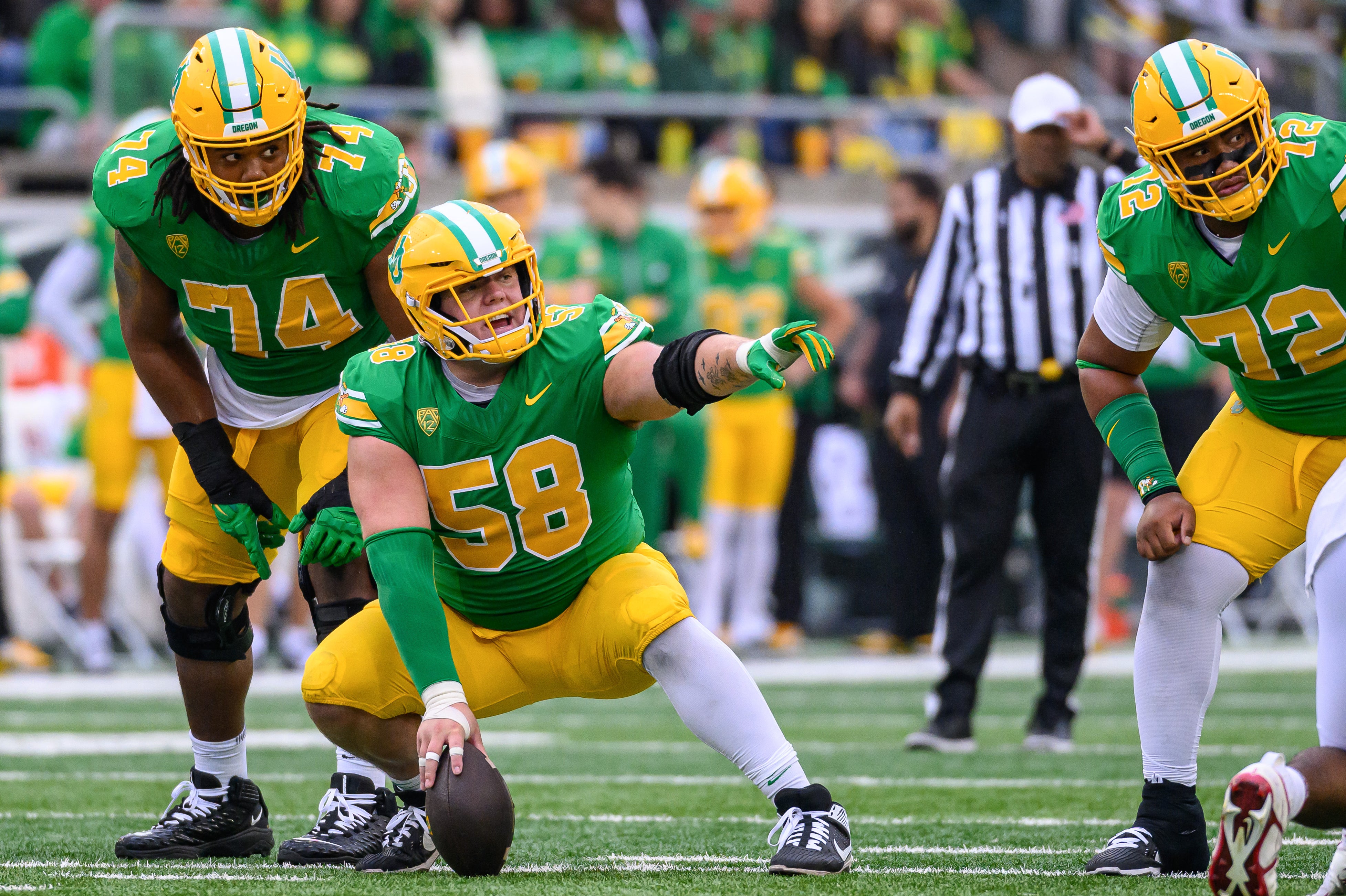 Oct 21, 2023; Eugene, Oregon, USA; Oregon Ducks offensive lineman Jackson Powers-Johnson (58) signals against the Washington State Cougars in the 4th quarter at Autzen Stadium.
