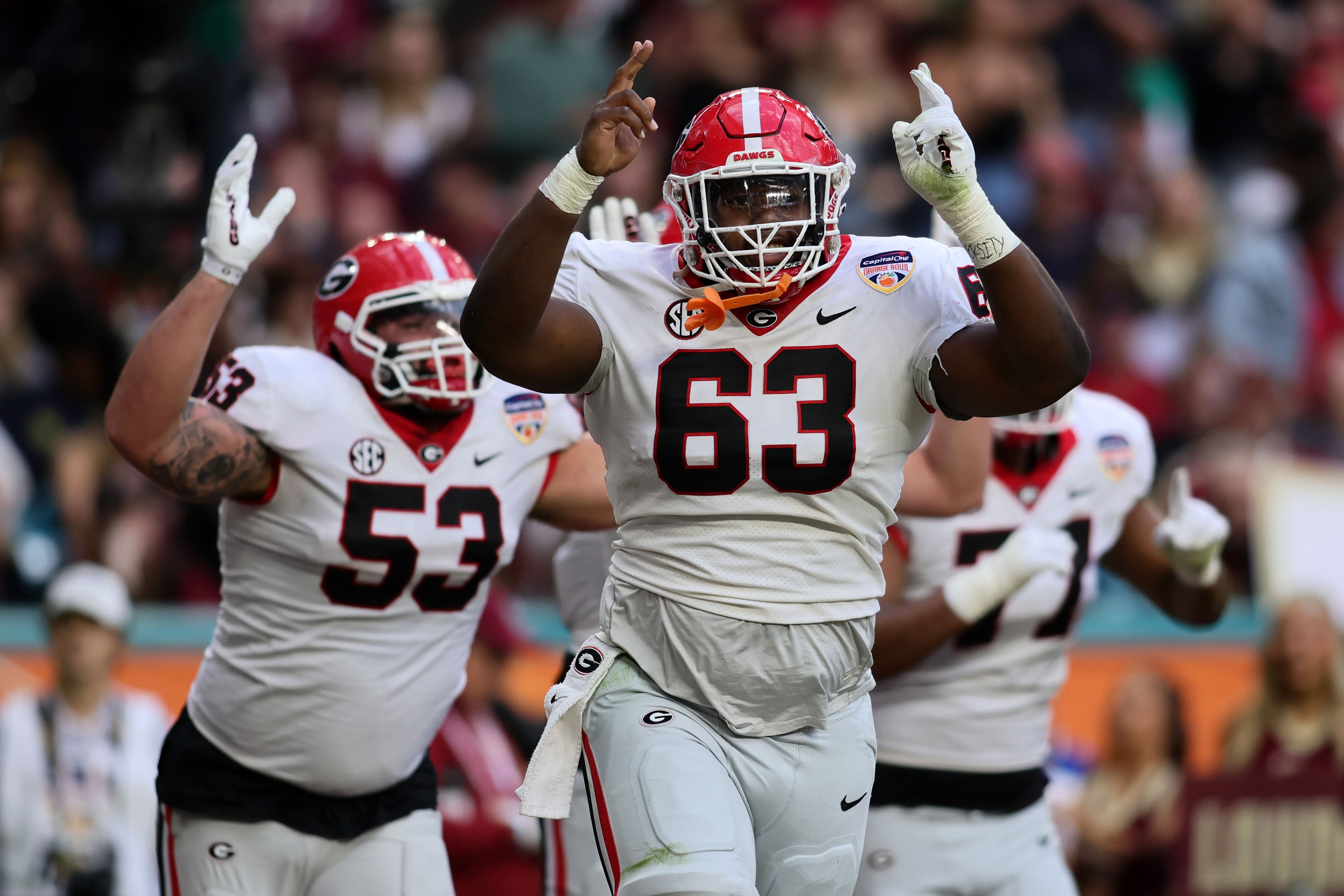 Dec 30, 2023; Miami Gardens, FL, USA; Georgia Bulldogs offensive lineman Sedrick Van Pran (63) reacts against the Florida State Seminoles during the first half in the 2023 Orange Bowl at Hard Rock Stadium.