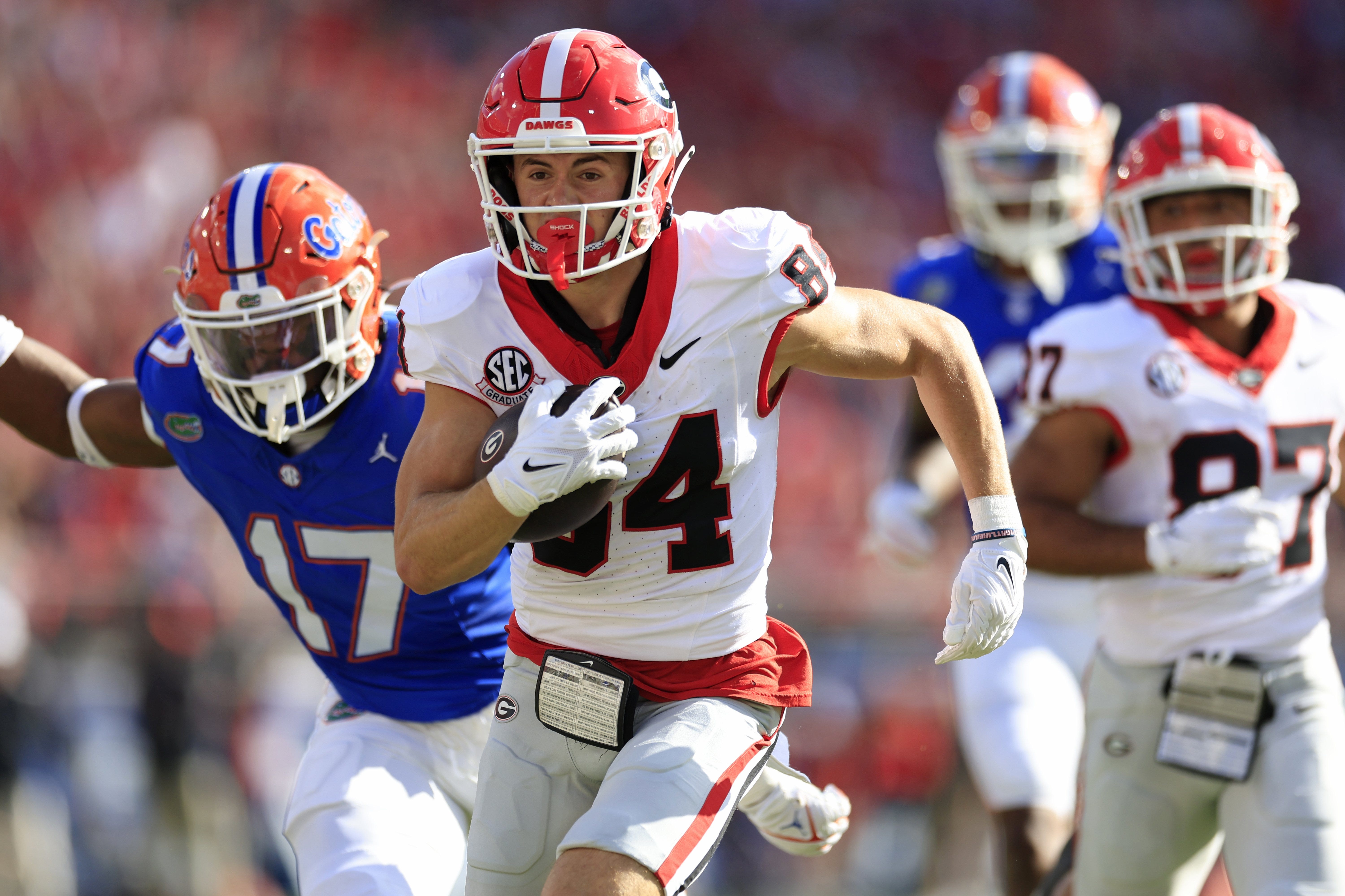 Georgia Bulldogs wide receiver Ladd McConkey (84) scores a touchdown during the first quarter of an NCAA Football game Saturday, Oct. 28, 2023 at EverBank Stadium in Jacksonville, Fla.