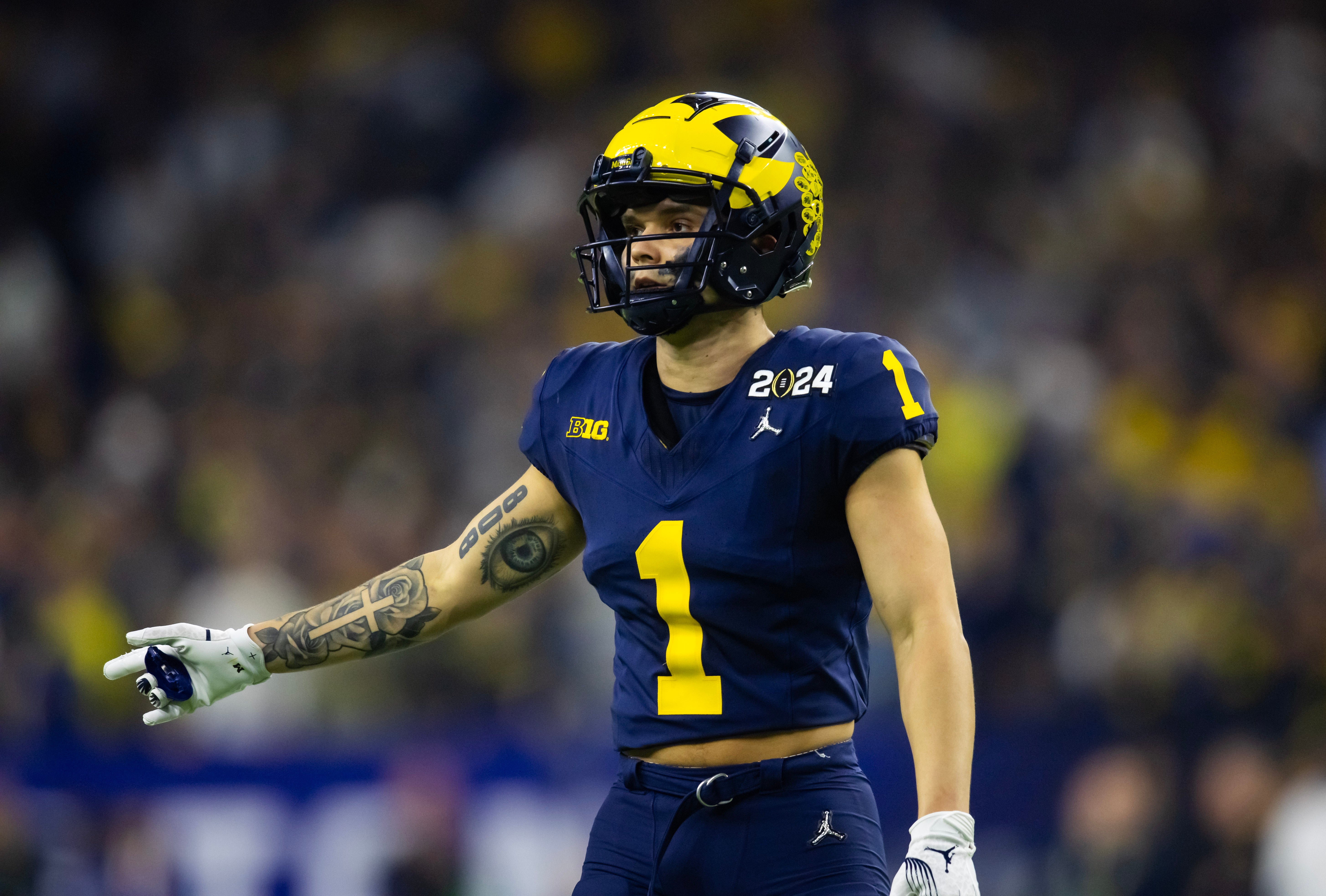 Jan 8, 2024; Houston, TX, USA; Michigan Wolverines wide receiver Roman Wilson (1) against the Washington Huskies during the 2024 College Football Playoff national championship game at NRG Stadium.