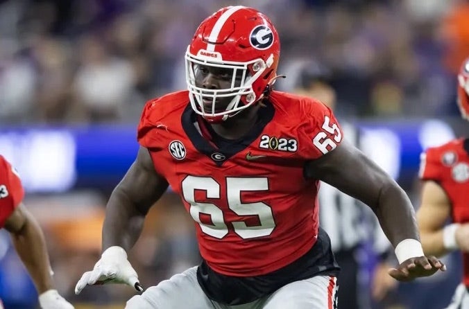Georgia Bulldogs offensive lineman Amarius Mims (65) against the TCU Horned Frogs during the CFP national championship game at SoFi Stadium.