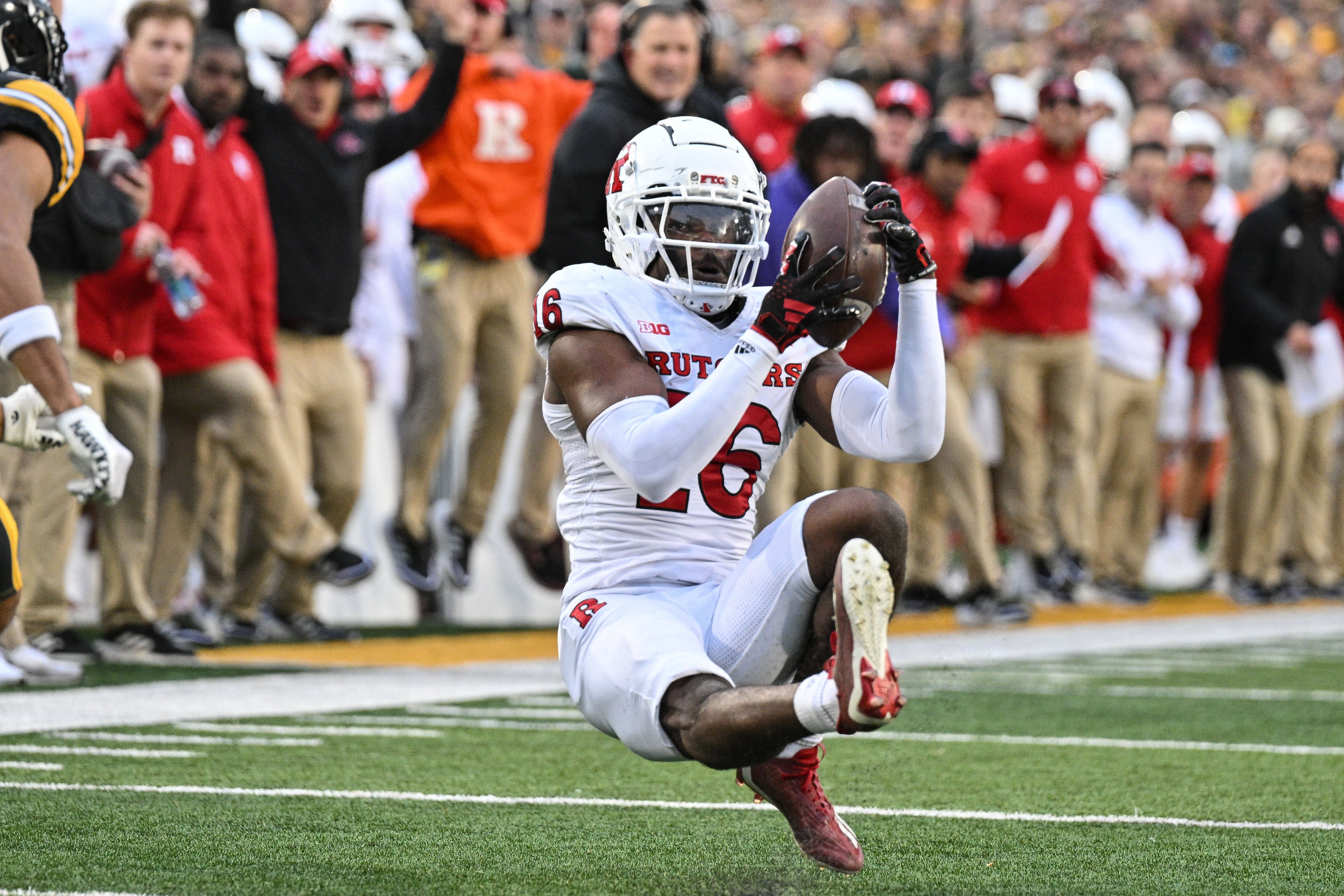 Rutgers Scarlet Knights defensive back Max Melton (16) intercepts a pass from Iowa Hawkeyes quarterback Deacon Hill (not pictured) during the second quarter at Kinnick Stadium. Jeffrey Becker-USA TODAY Sports