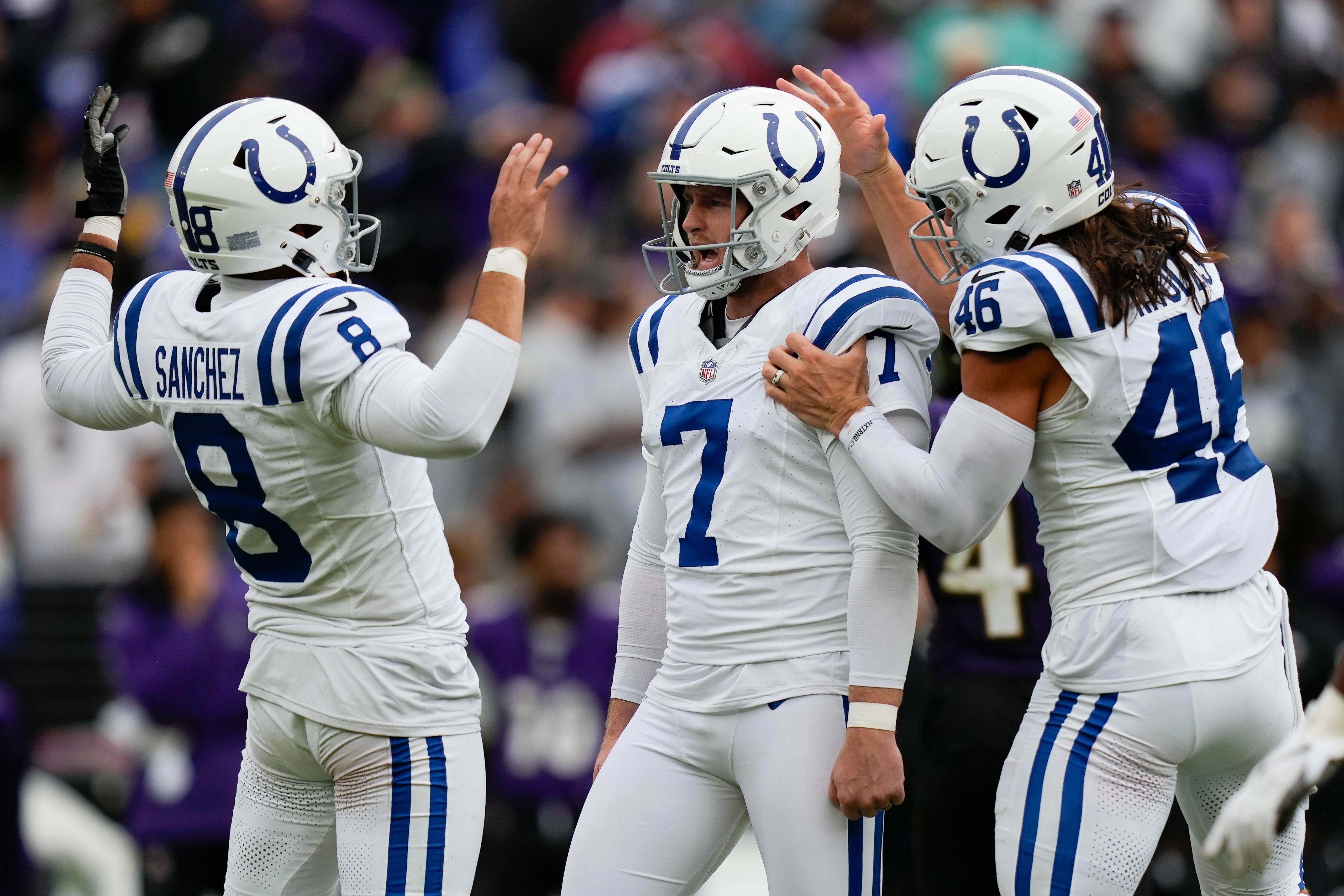 Sep 24, 2023; Baltimore, Maryland, USA; Indianapolis Colts punter Rigoberto Sanchez (8), Indianapolis Colts place kicker Matt Gay (7), and Indianapolis Colts long snapper Luke Rhodes (46) react after Gay kicks a game winning field goal in overtime to beat the Baltimore Ravens at M&T Bank Stadium.