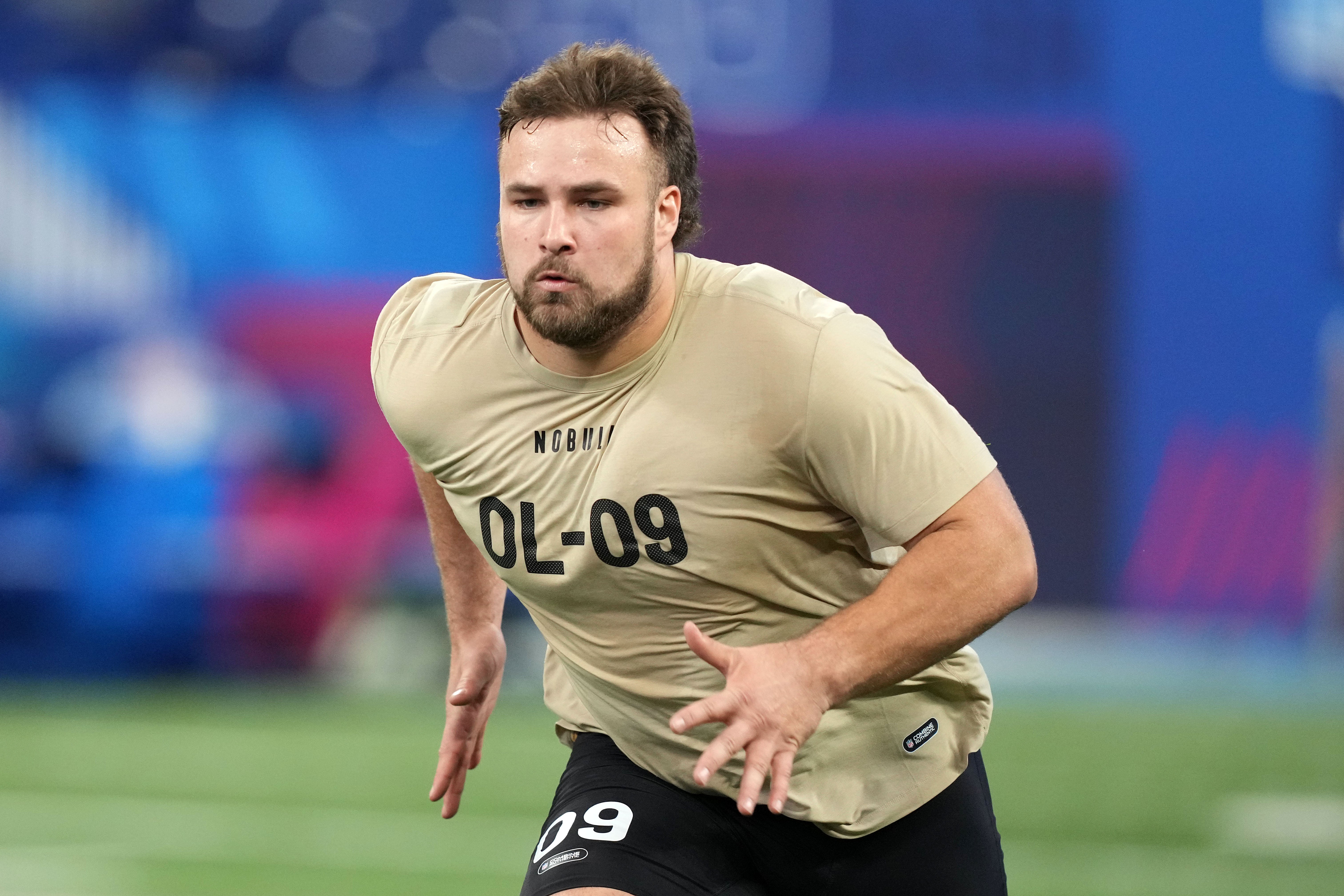 Mar 3, 2024; Indianapolis, IN, USA; Wisconsin offensive lineman Tanor Bortolini (OL09) during the 2024 NFL Combine at Lucas Oil Stadium.