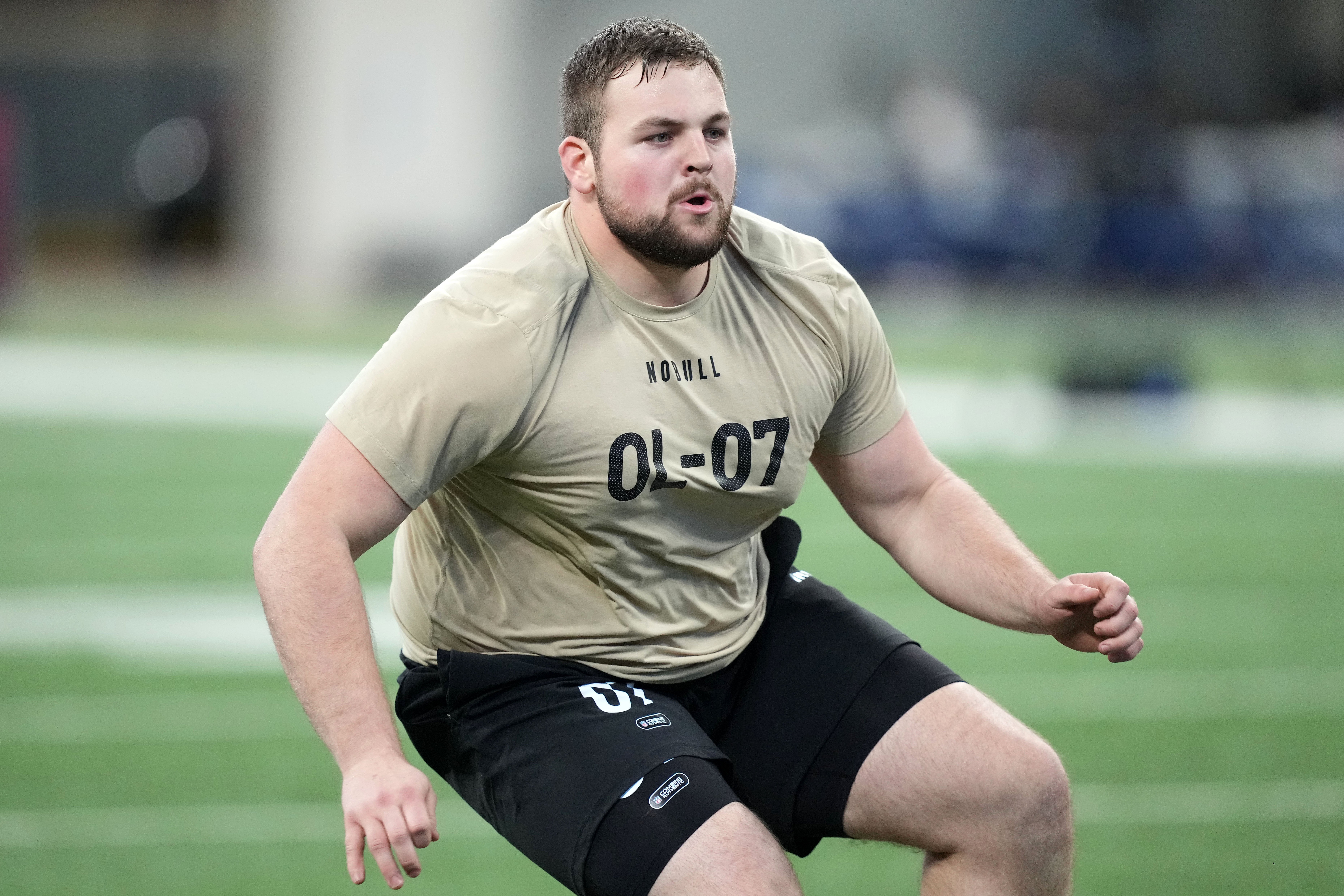 Mar 3, 2024; Indianapolis, IN, USA; Kansas State offensive lineman Cooper Beebe (OL07) during the 2024 NFL Combine at Lucas Oil Stadium.
