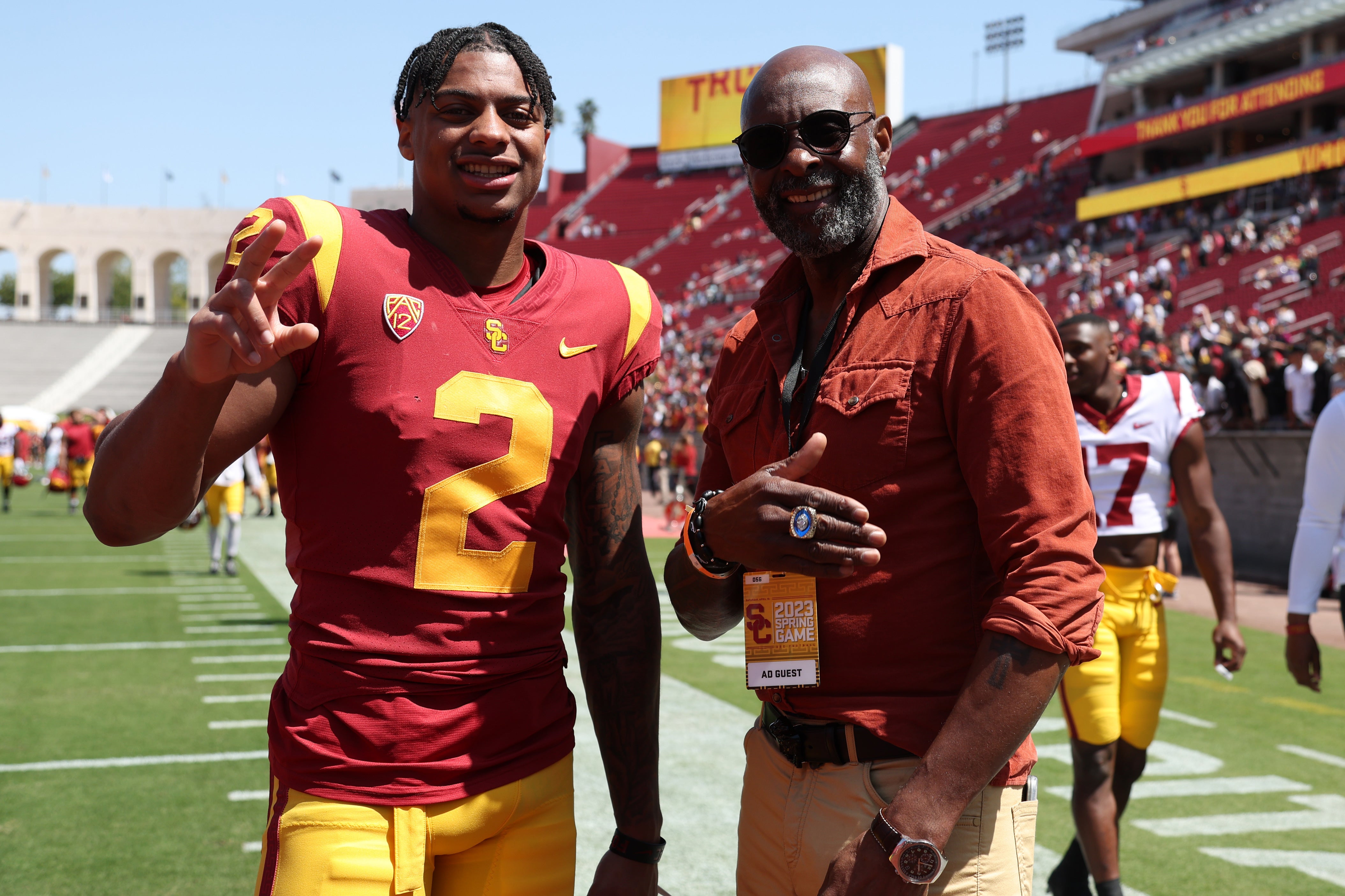 Apr 15, 2023; Los Angeles, CA, USA; USC Trojans wide receiver Brenden Rice (2) and member of the Pro Football Hall of Fame Jerry Rice pose for a photo after the Spring Game at Los Angeles Memorial Coliseum.