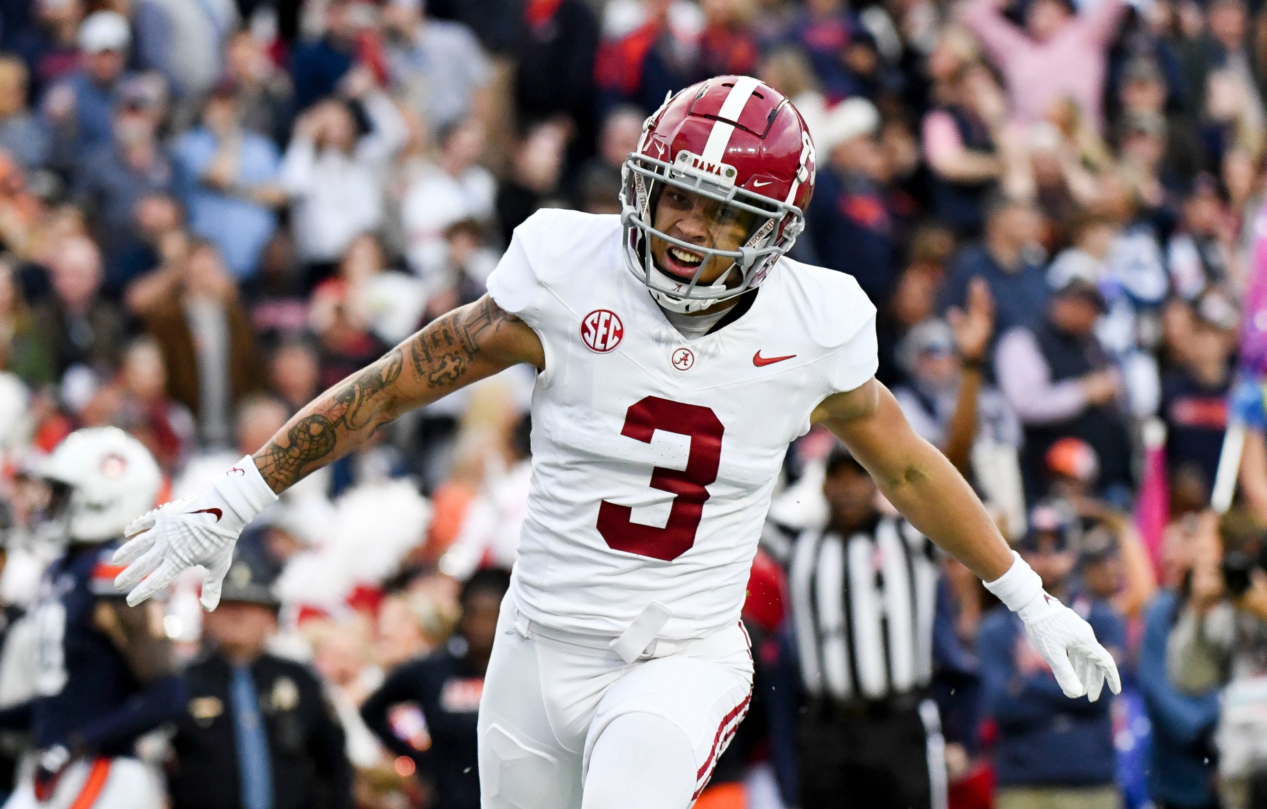 Nov 25, 2023; Auburn, Alabama, USA; Alabama Crimson Tide wide receiver Jermaine Burton (3) celebrates his touchdown against Auburn at Jordan-Hare Stadium.