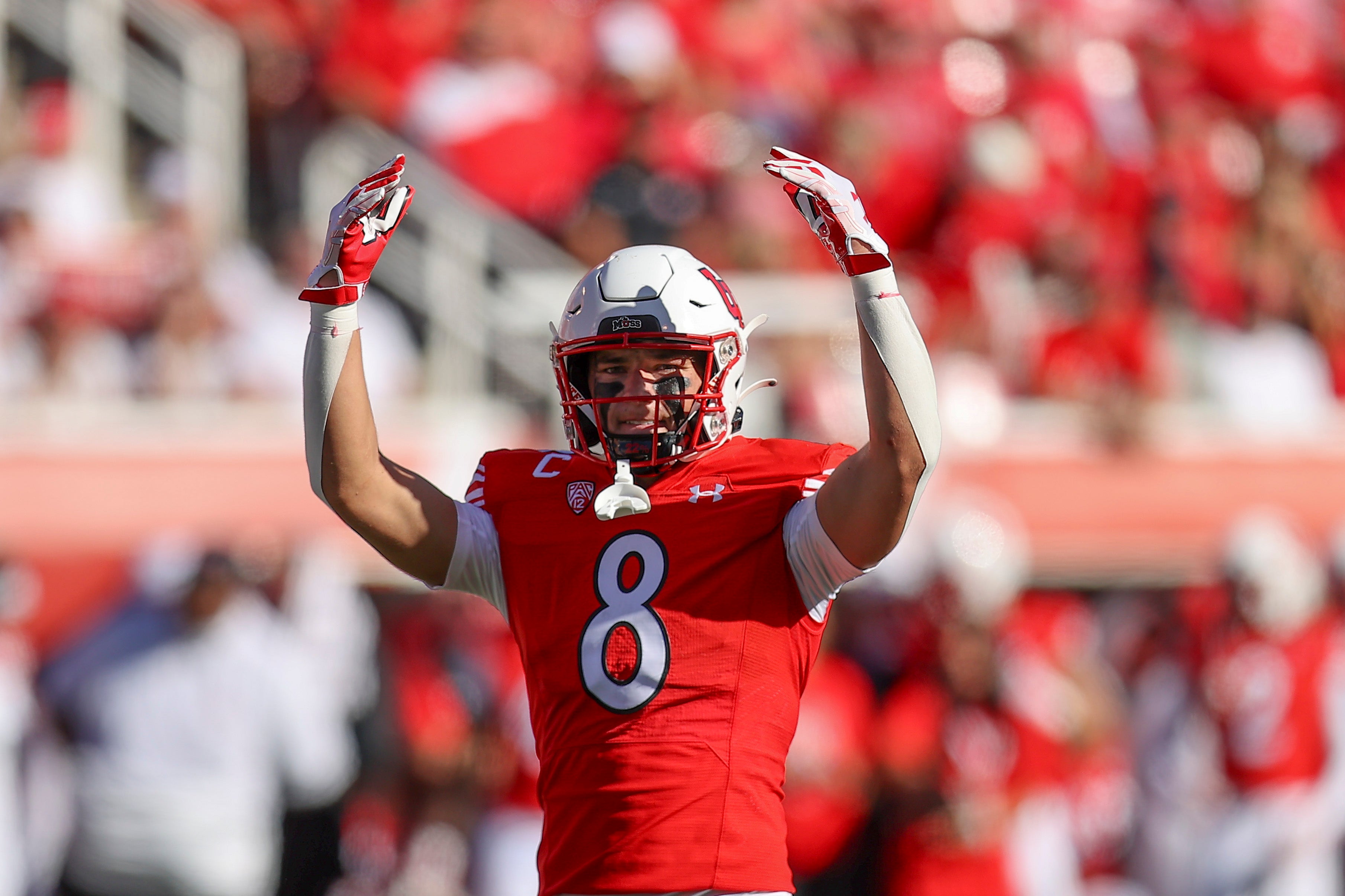 Sep 23, 2023; Salt Lake City, Utah, USA; Utah Utes safety Cole Bishop (8) encourages the fans to cheer during a third down against the UCLA Bruins in the fourth at Rice-Eccles Stadium.