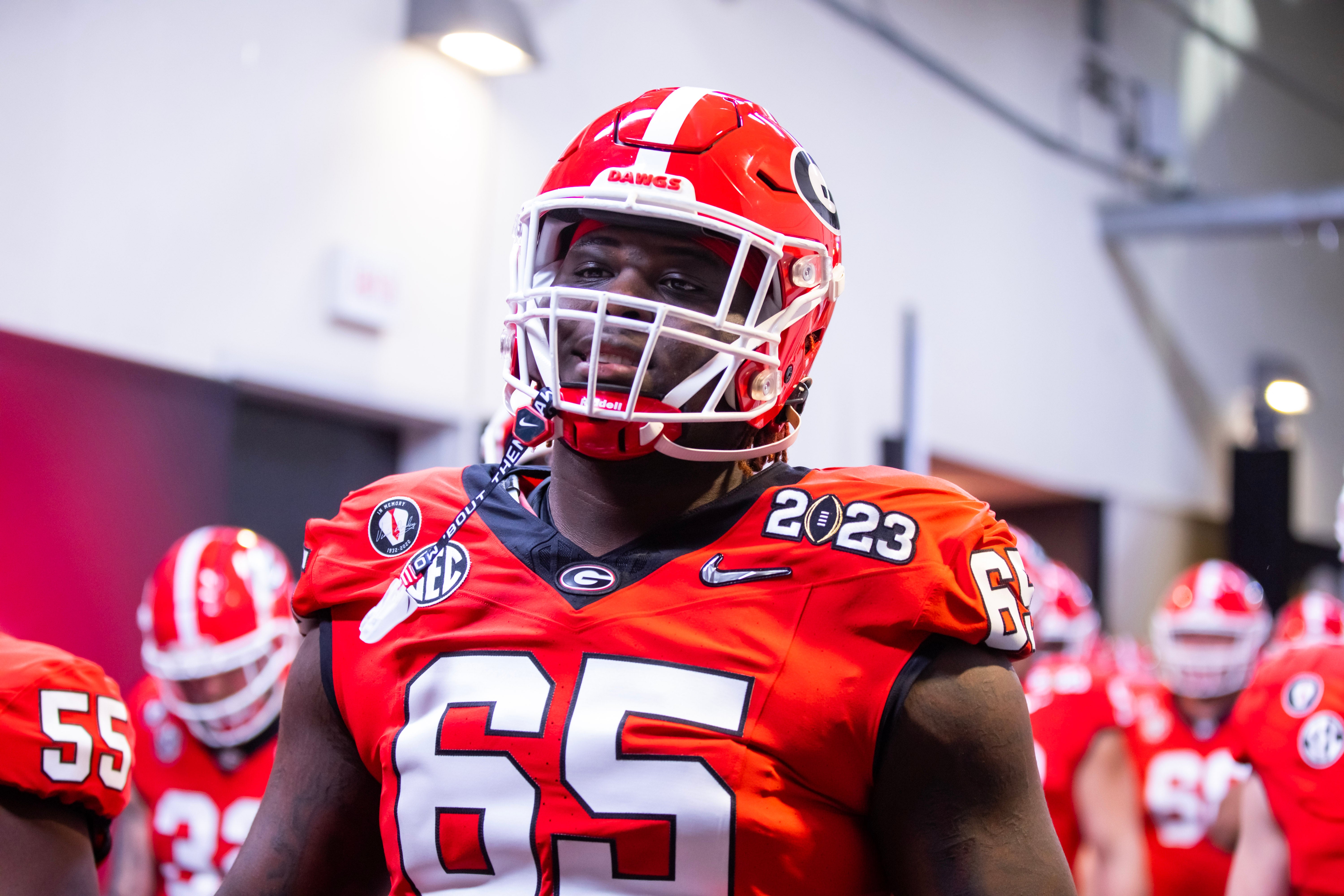 Jan 9, 2023; Inglewood, CA, USA; Georgia Bulldogs offensive lineman Amarius Mims (65) against the TCU Horned Frogs during the CFP national championship game at SoFi Stadium.